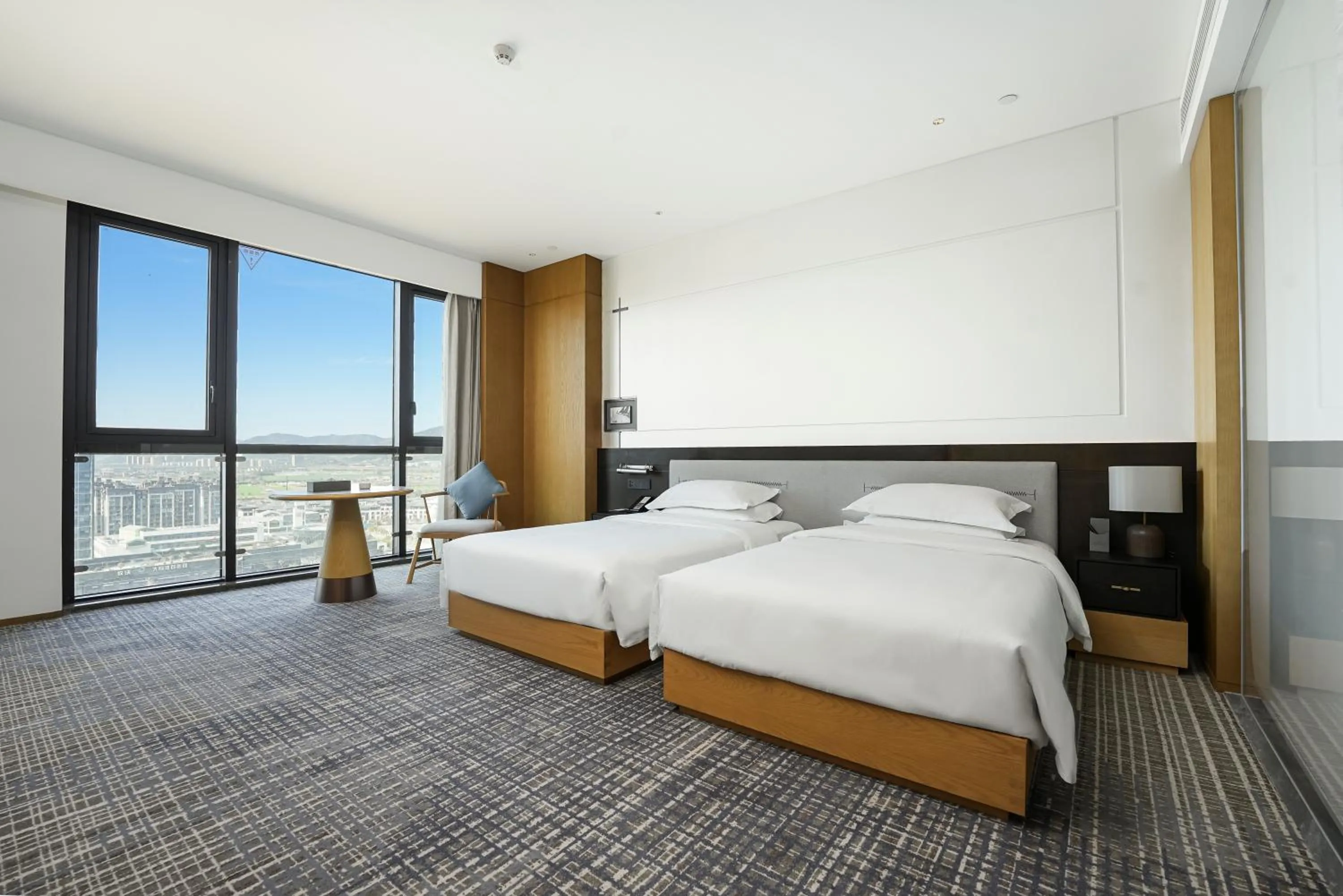 Bed in Holiday Inn Ningbo Xiangshan Damu Bay by IHG
