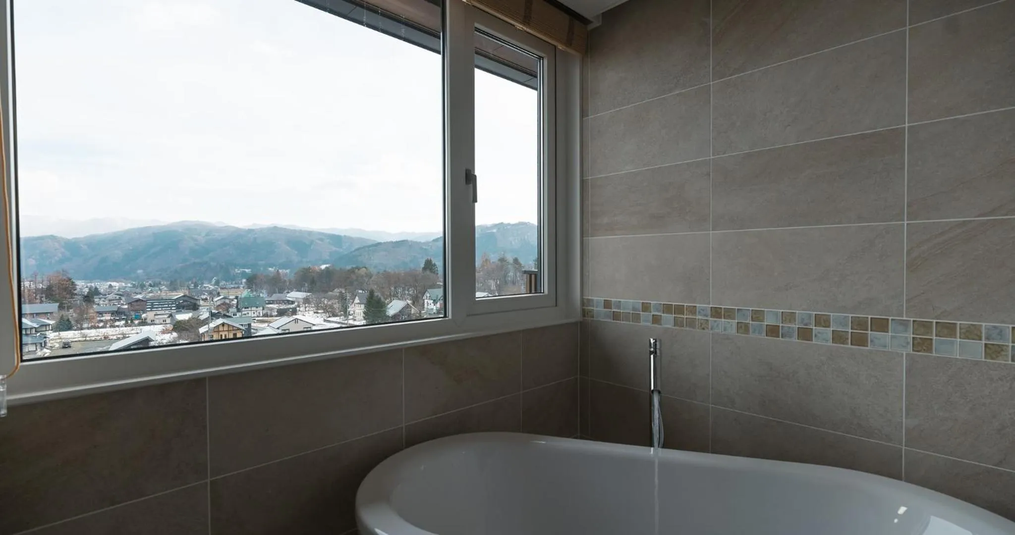 Bathroom in HOTEL LA VIGNE HAKUBA by Onko Chishin