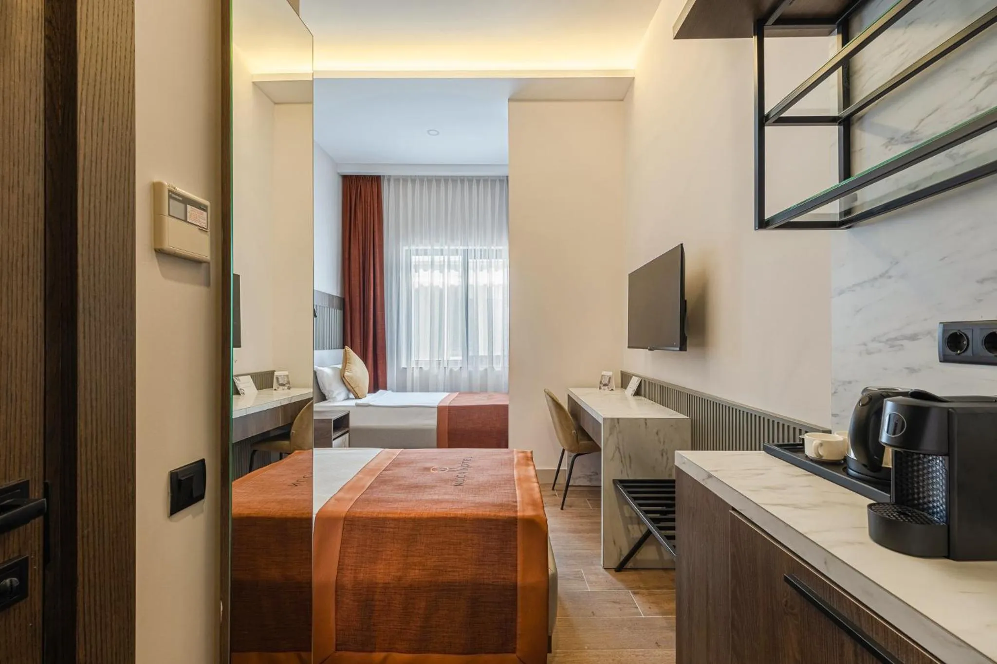 Photo of the whole room, Bed in Nuca Homes