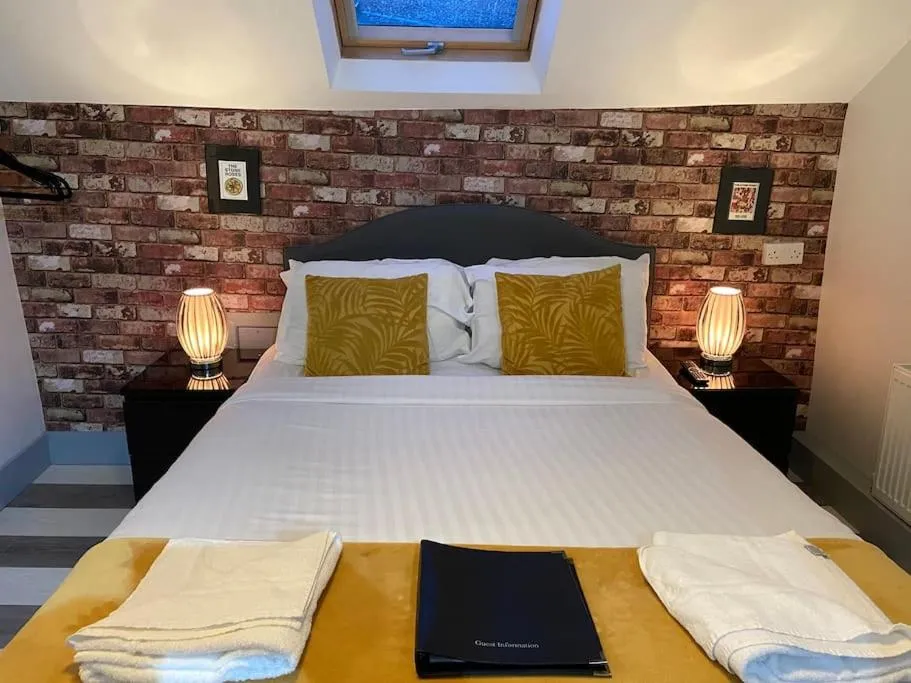 Photo of the whole room, Bed in Ivy Mount Boutique