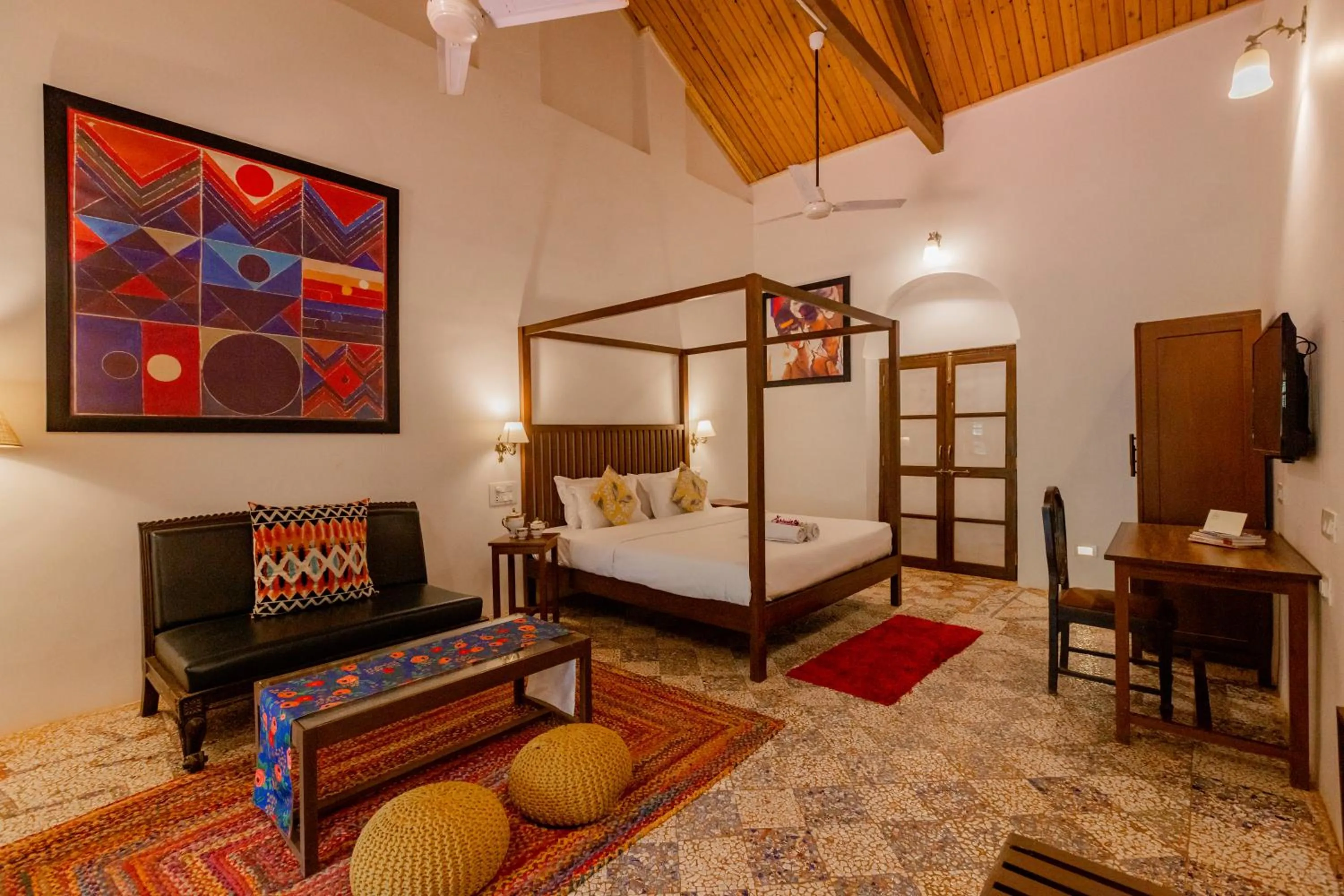 Living room, Bed in Radha Cottage Resort