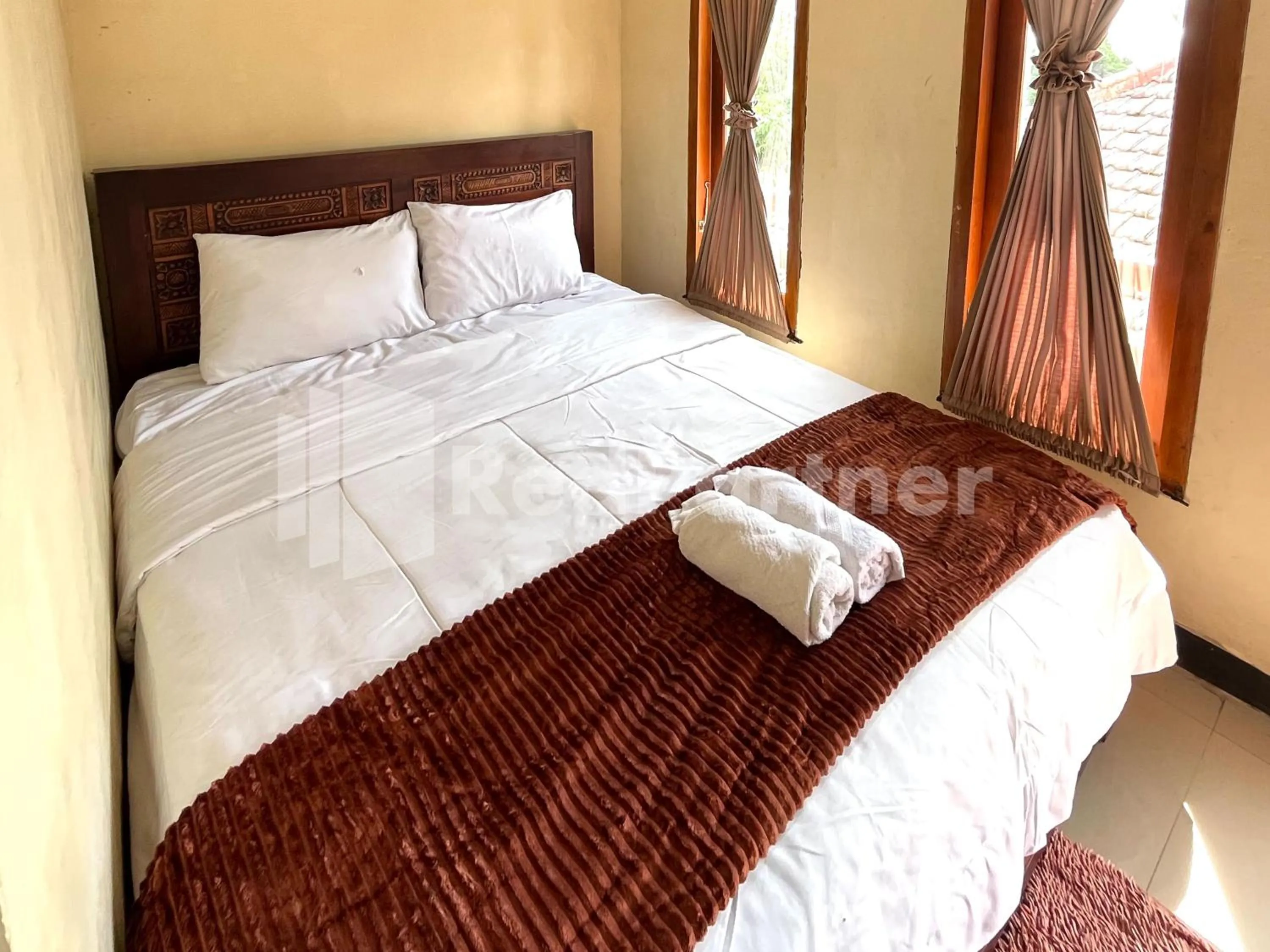 Bedroom, Bed in Family Homestay Syariah Bromo Mitra RedDoorz