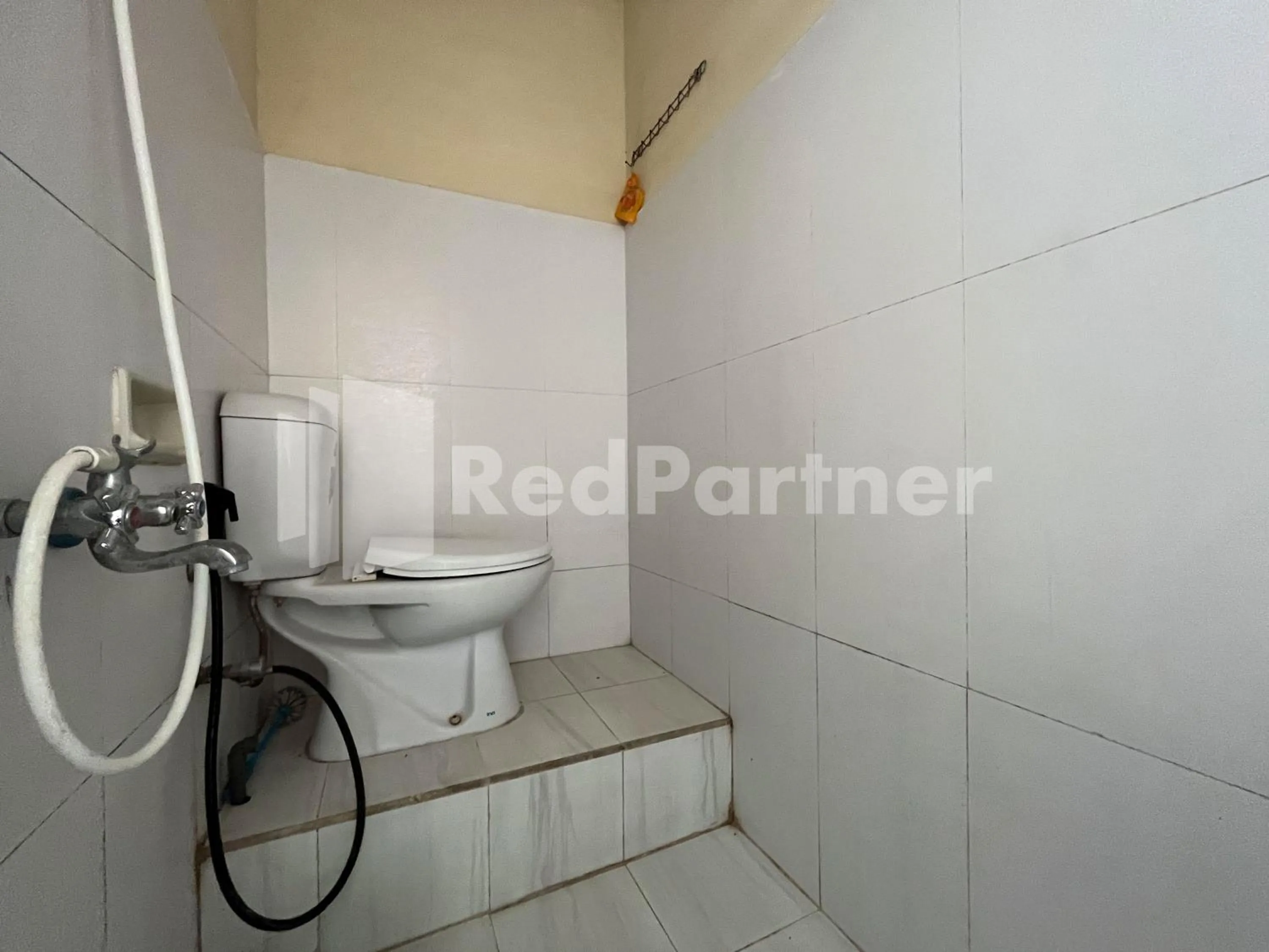 Bathroom in Family Homestay Syariah Bromo Mitra RedDoorz