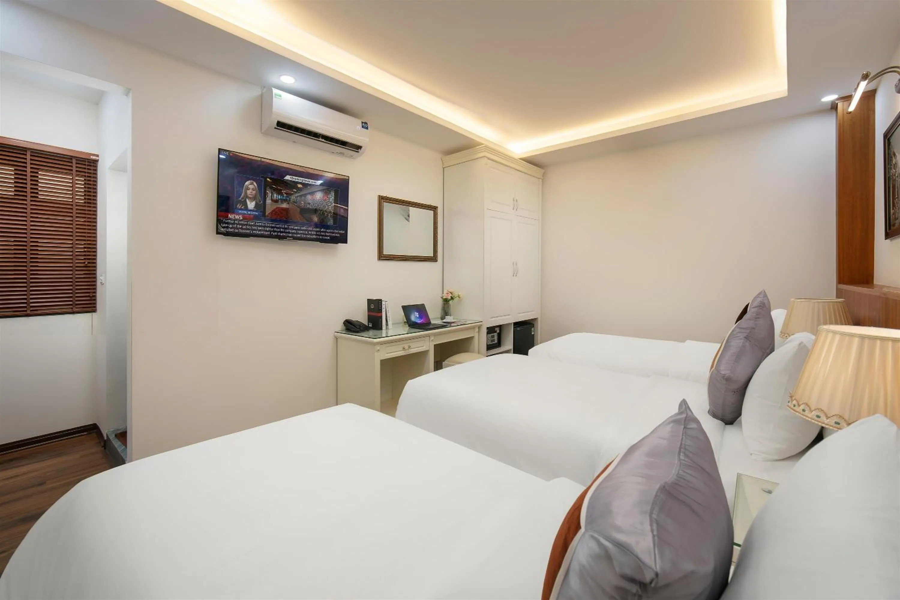 Bed in TrangTrang Luxury Hotel