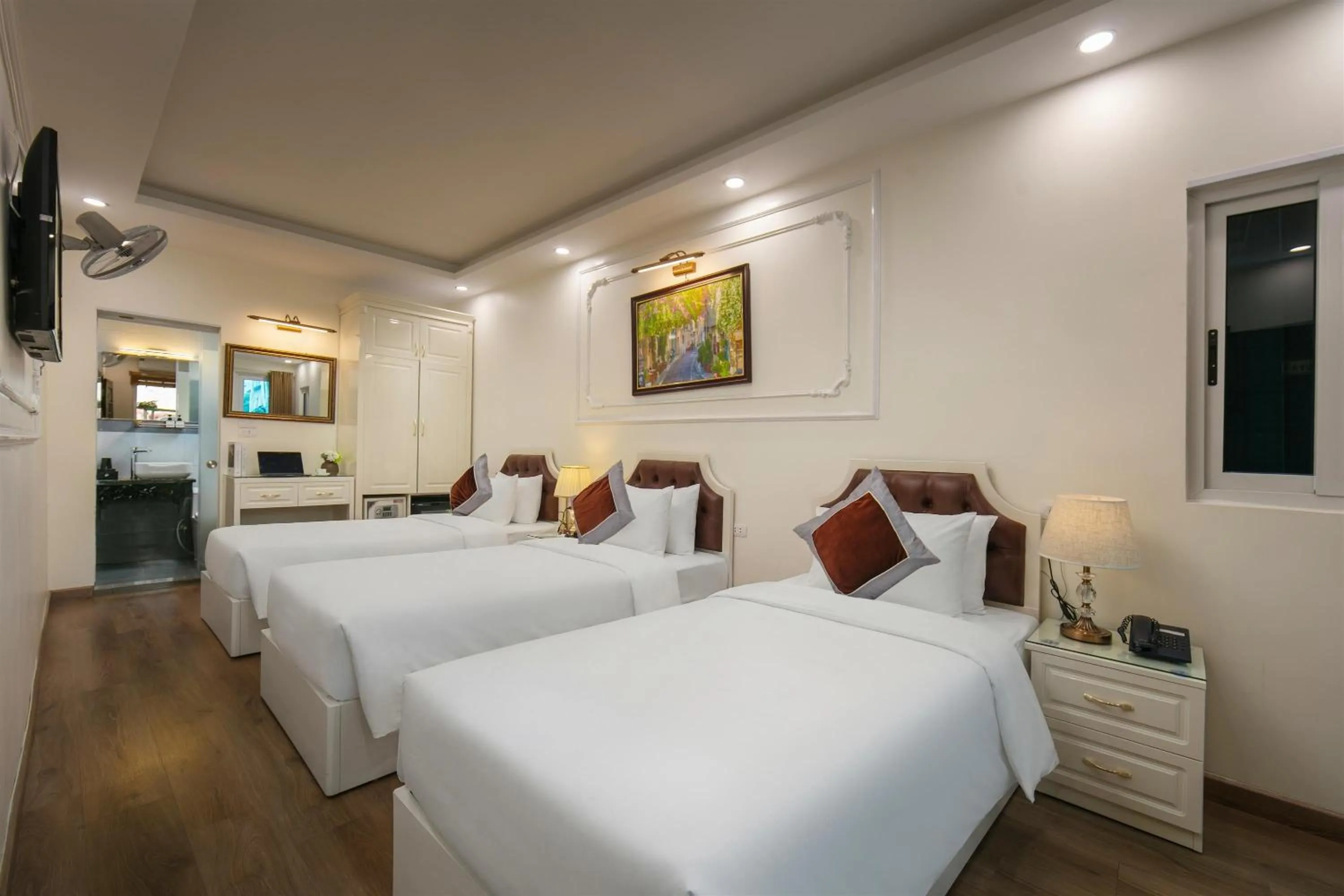 Bed in TrangTrang Luxury Hotel