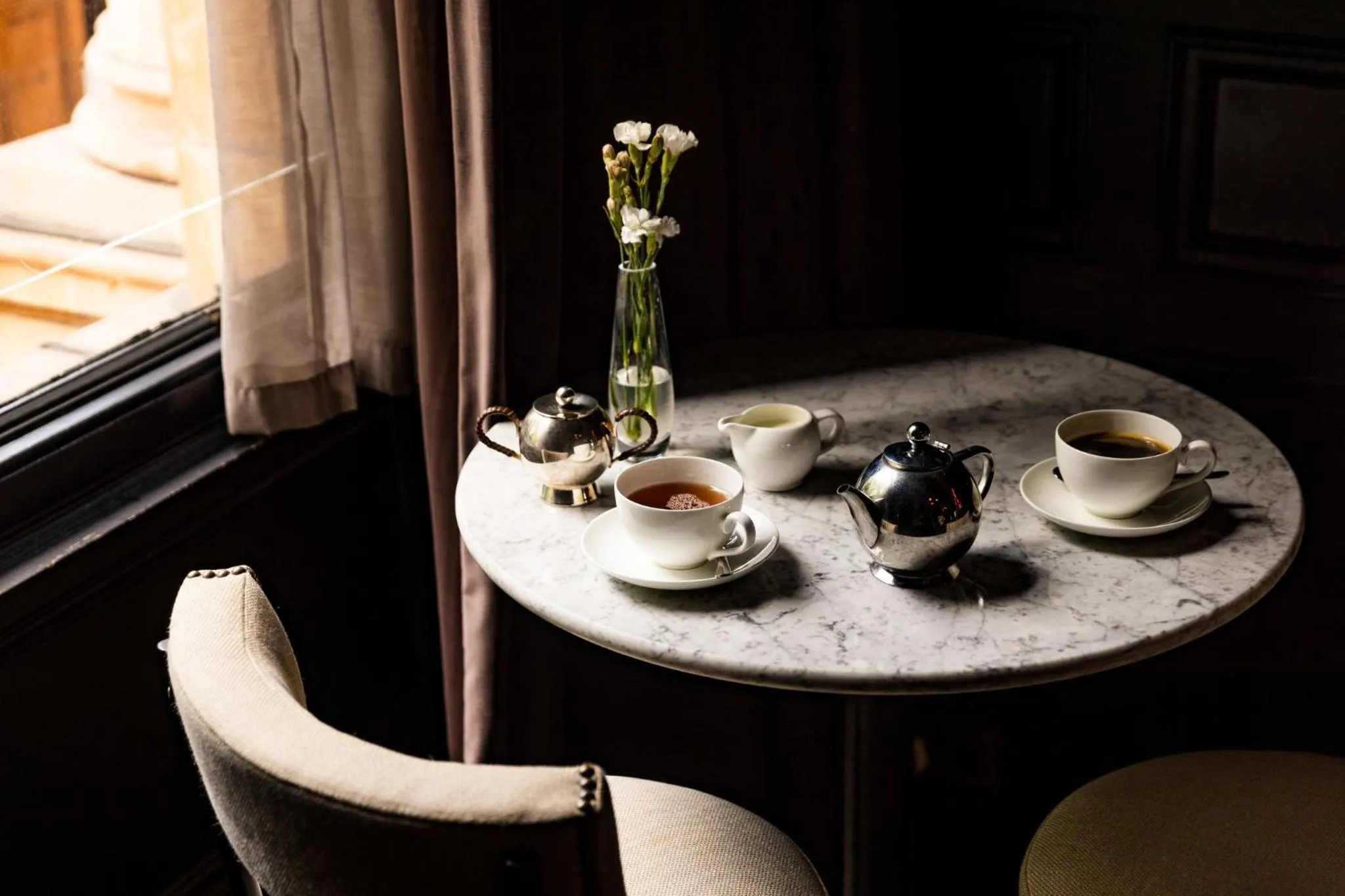 Lounge or bar in Kimpton Fitzroy London by IHG