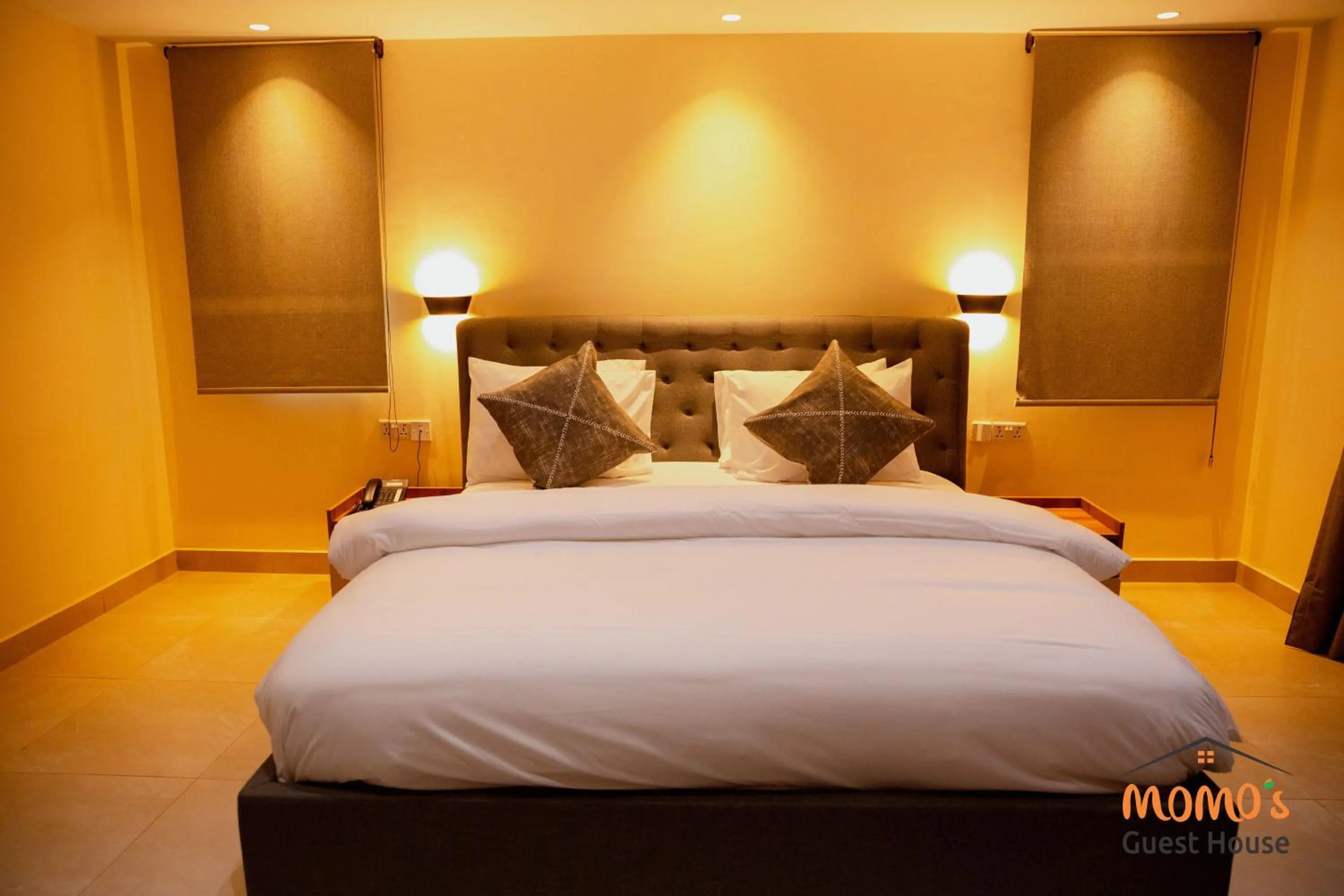 Bed in Momo's Hotel