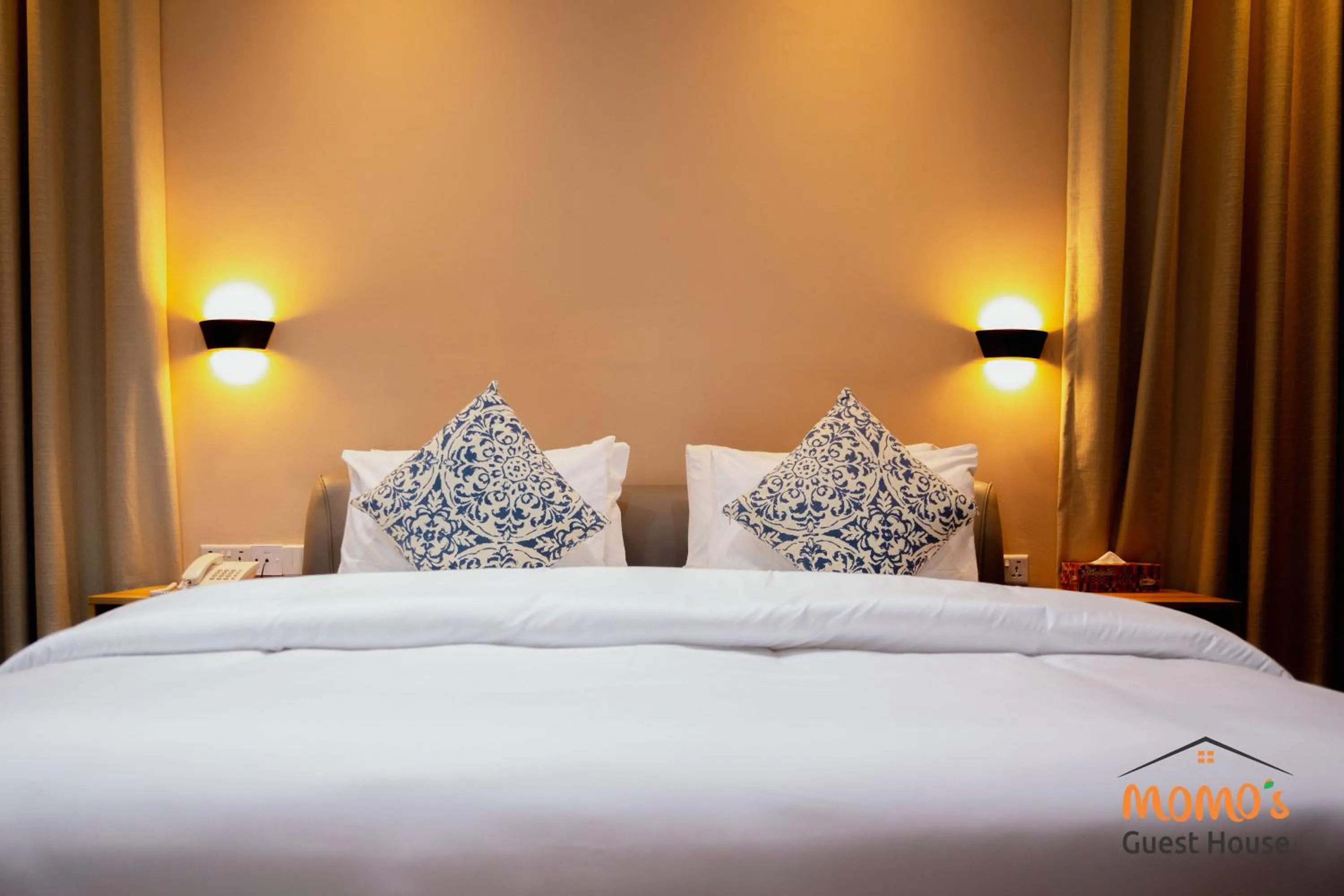 Bed in Momo's Hotel