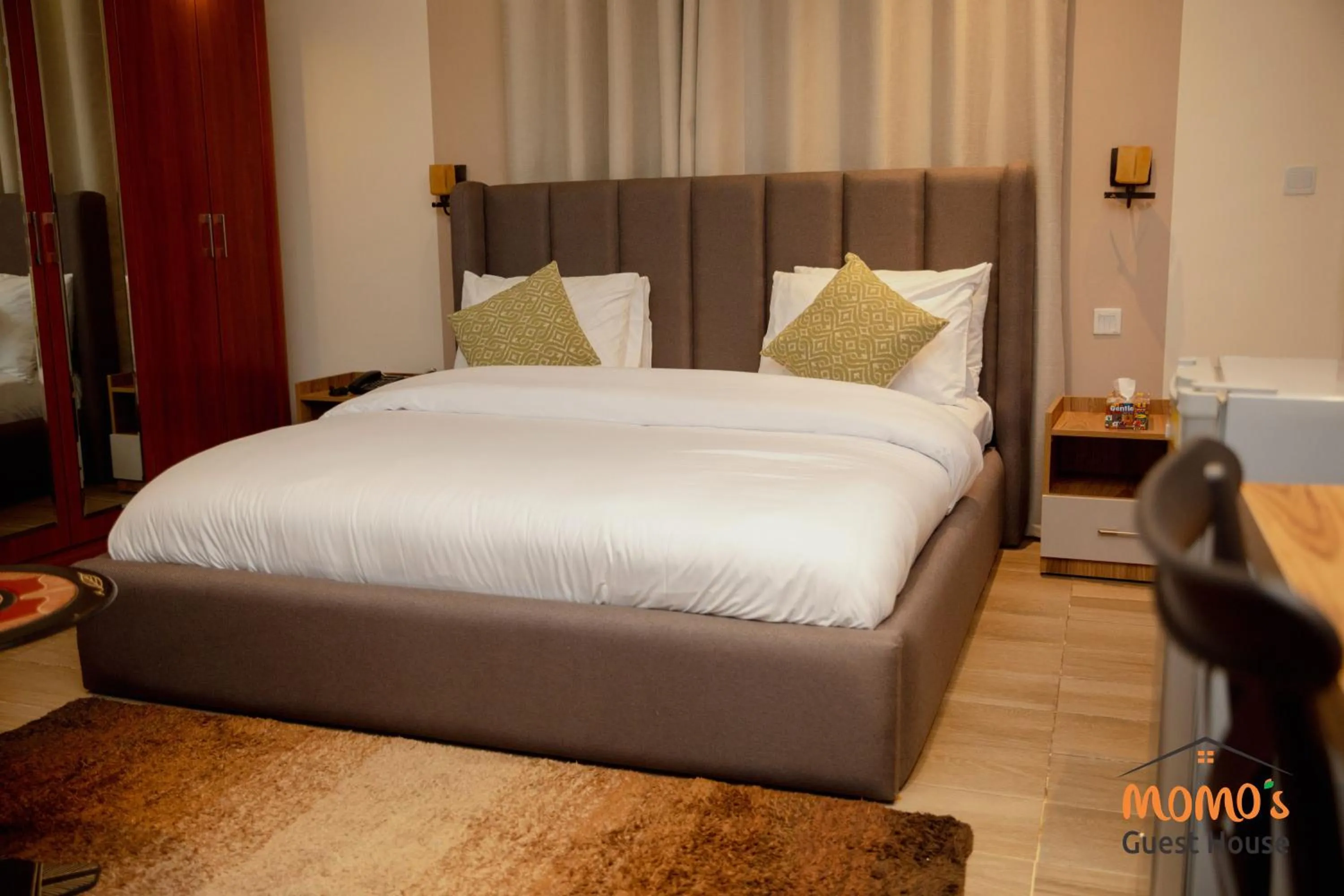 Bed in Momo's Hotel