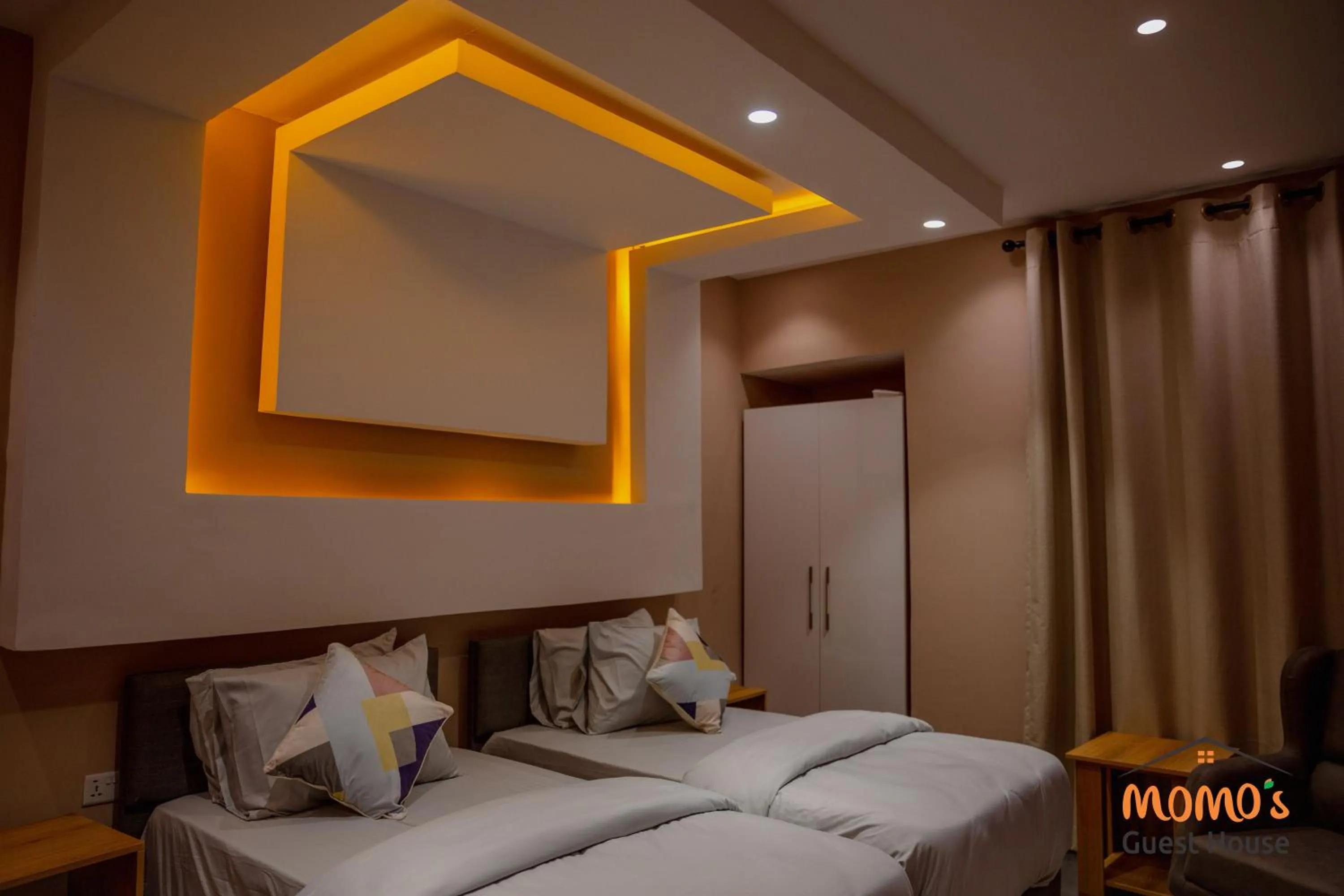 Bed in Momo's Hotel