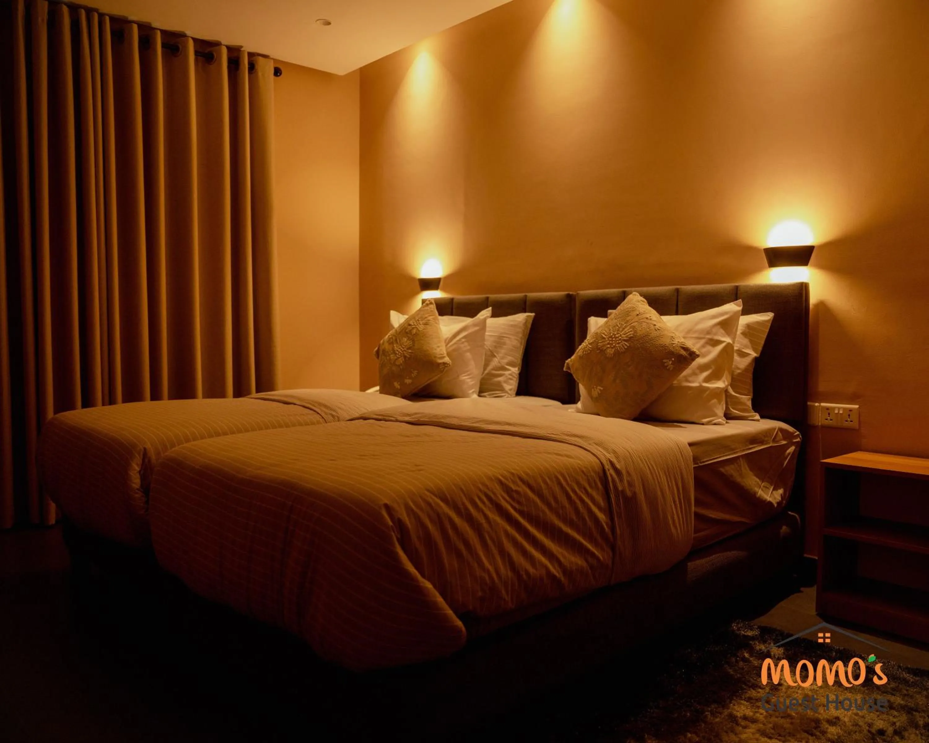 Bed in Momo's Hotel