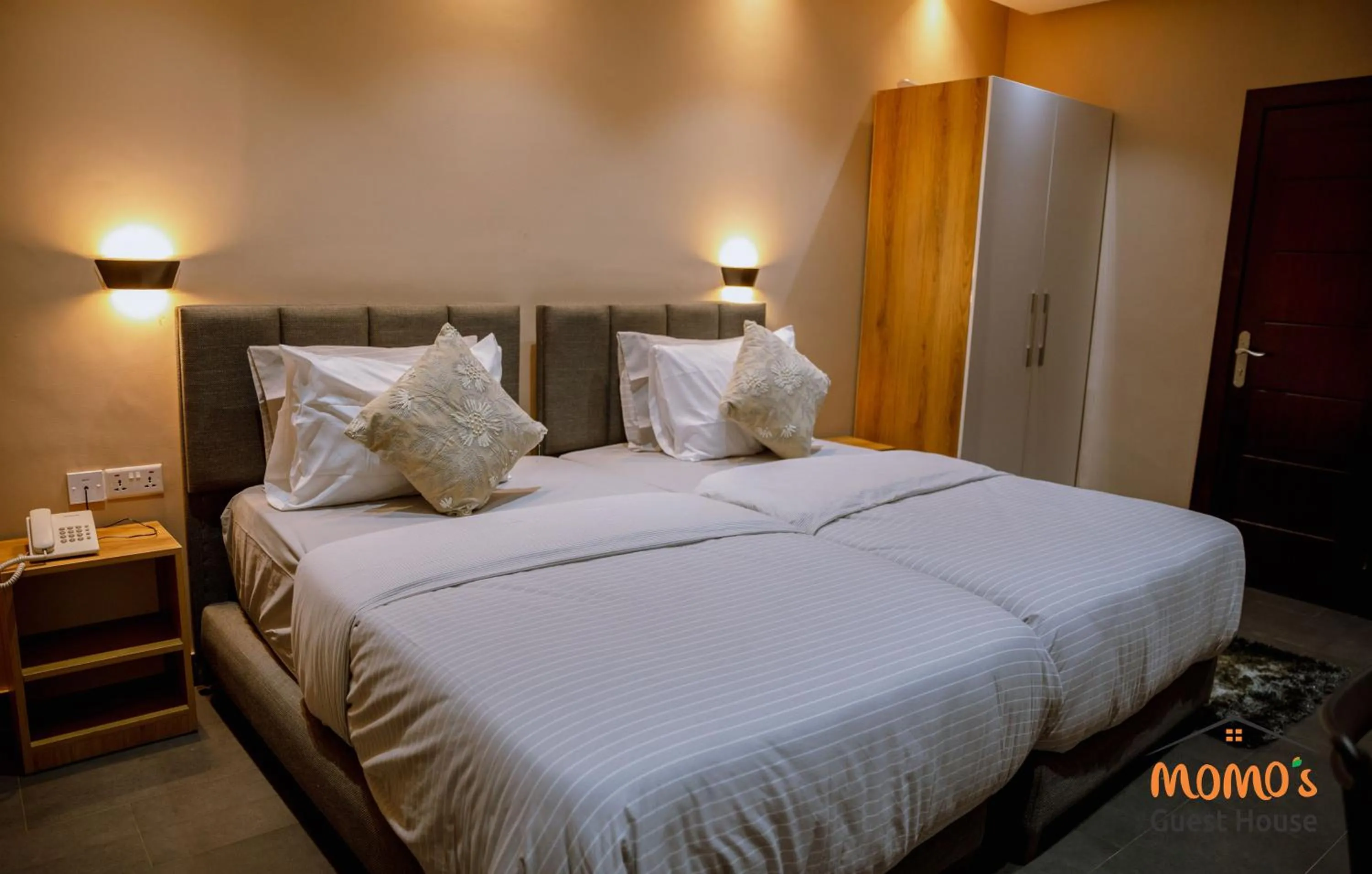 Bed in Momo's Hotel