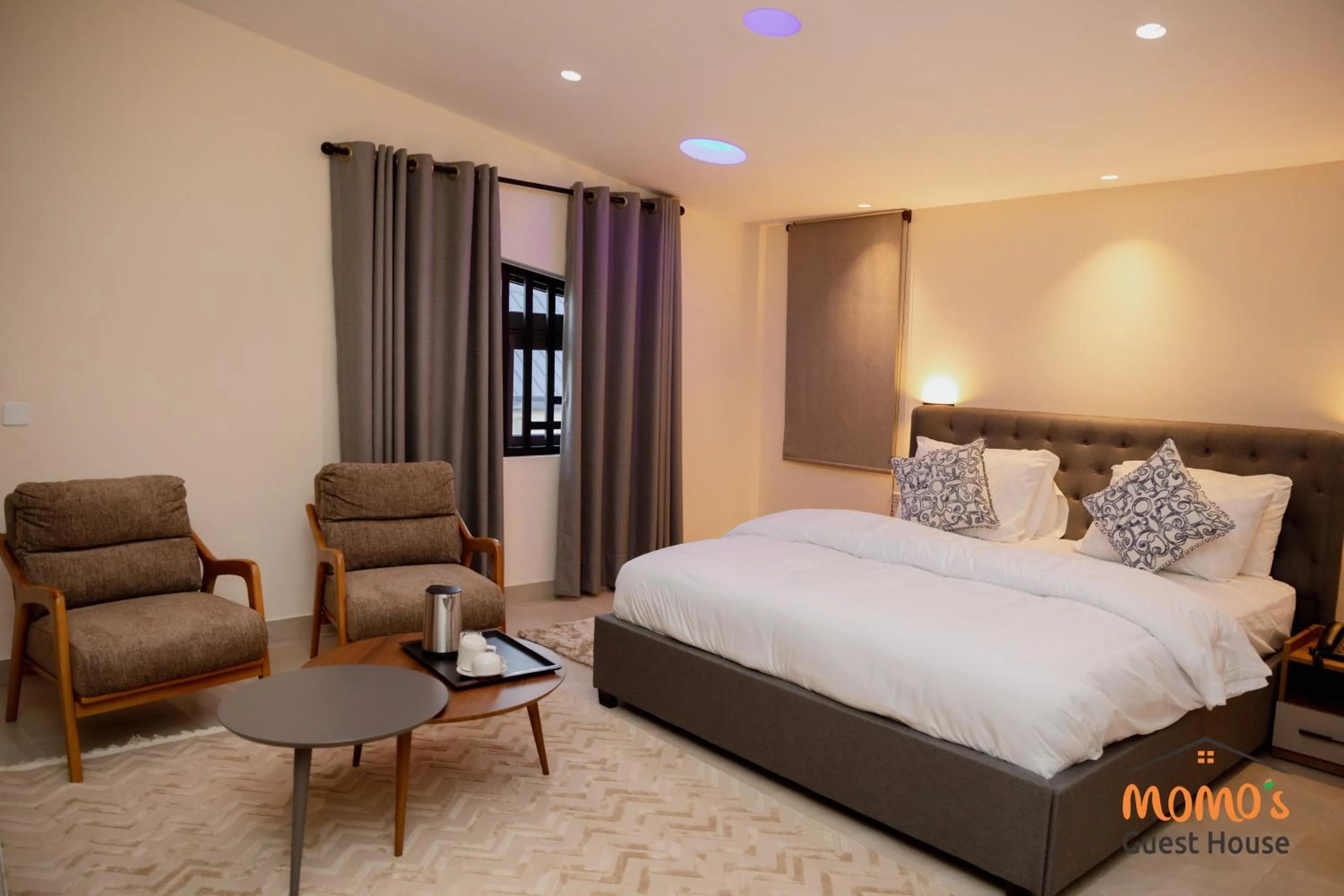 Bed in Momo's Hotel