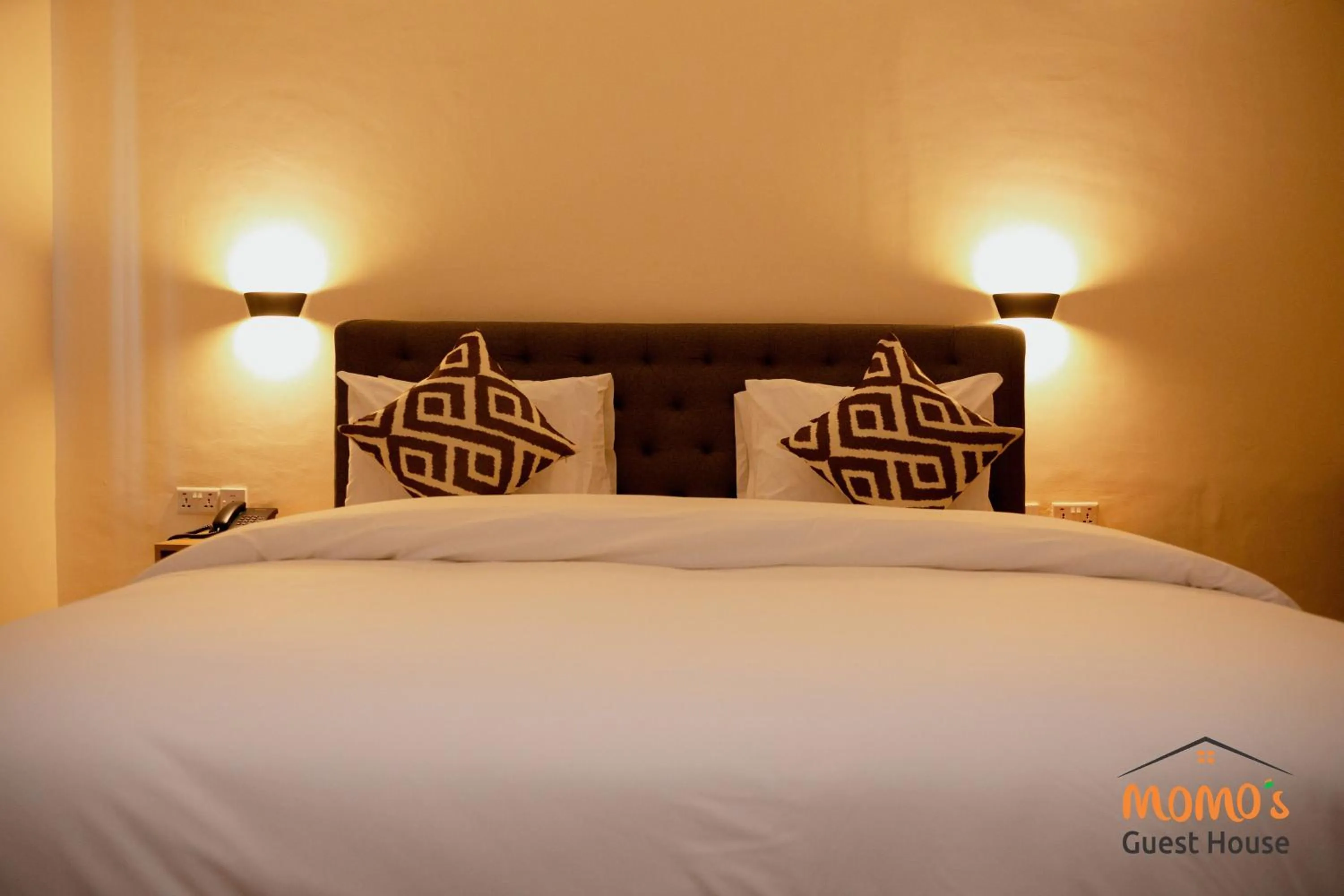 Bed in Momo's Hotel