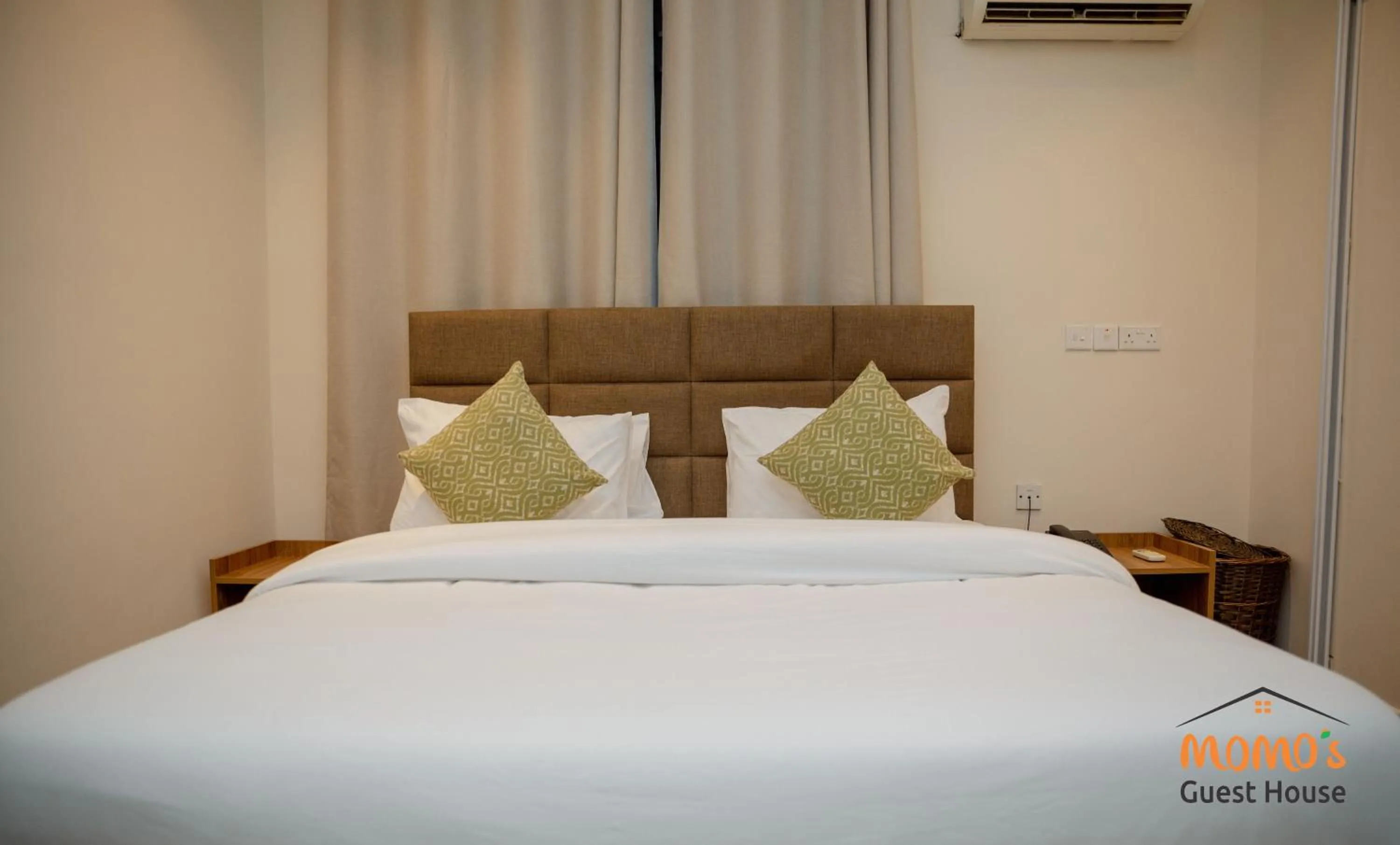 Bed in Momo's Hotel