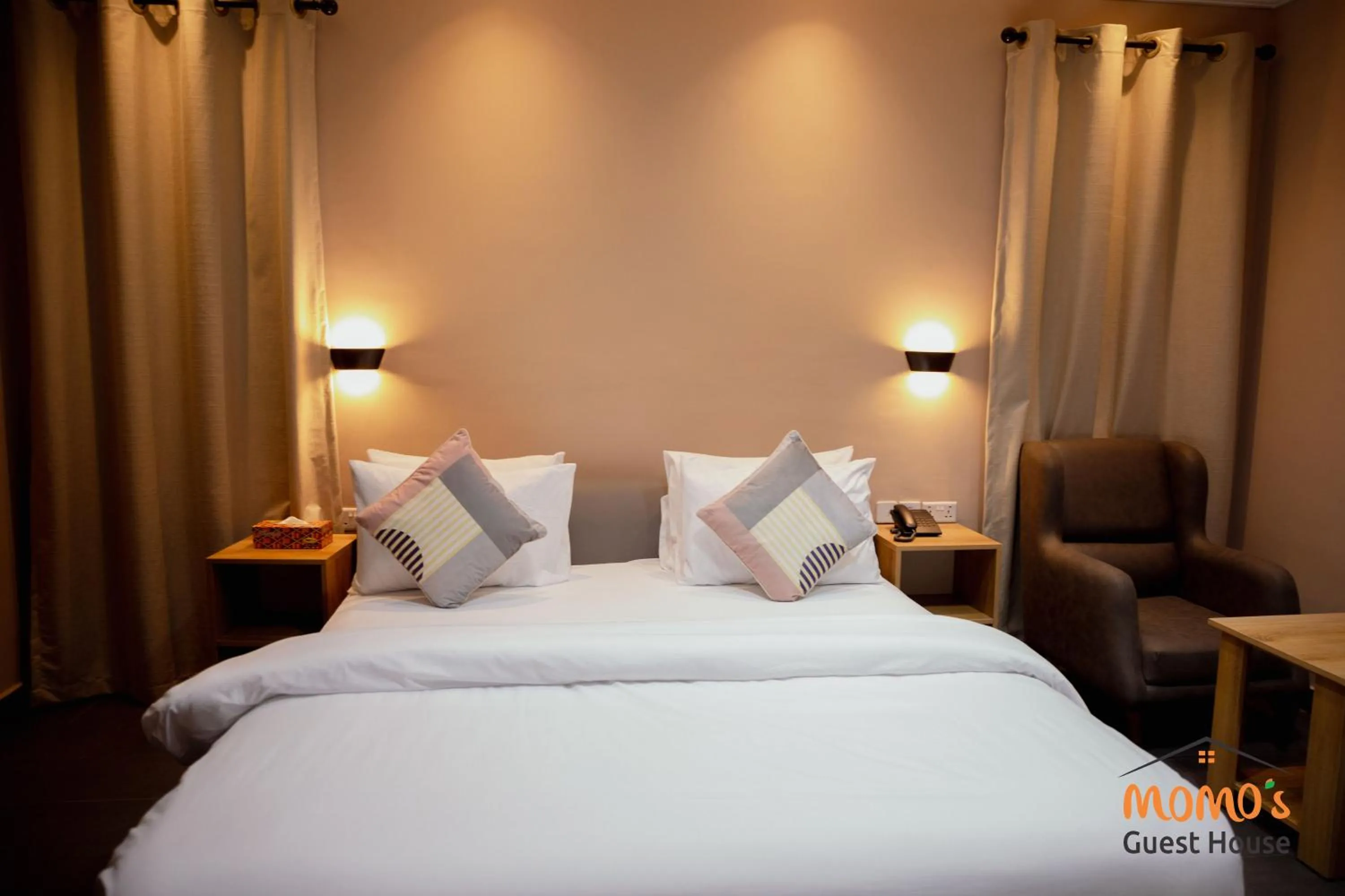 Bed in Momo's Hotel