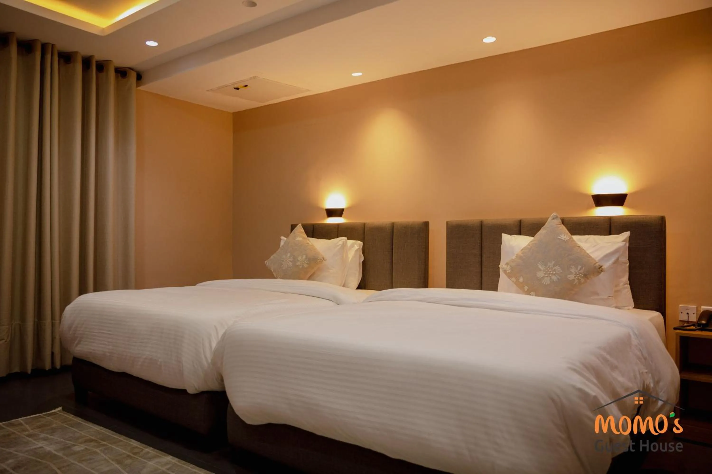 Bed in Momo's Hotel