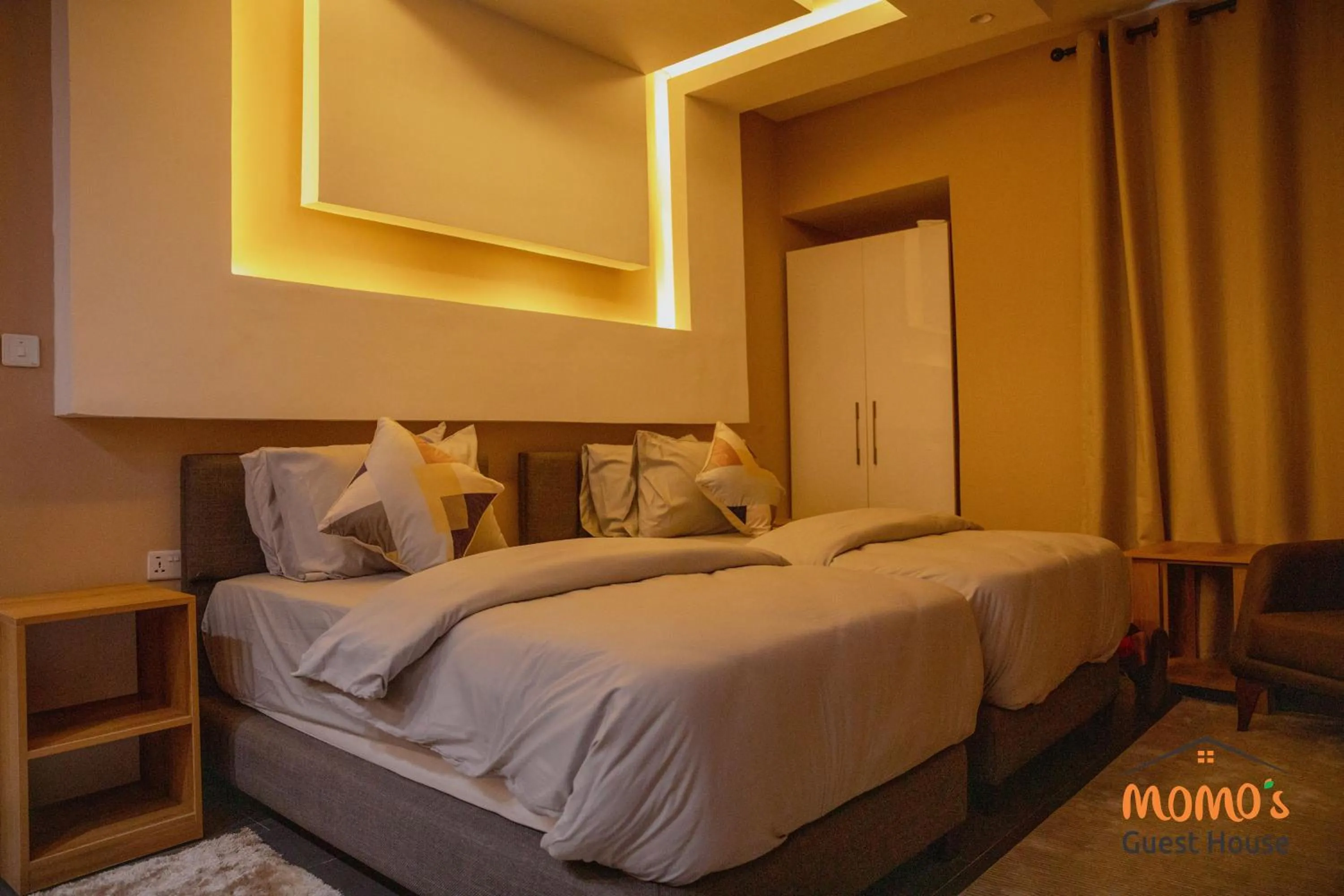 Bed in Momo's Hotel