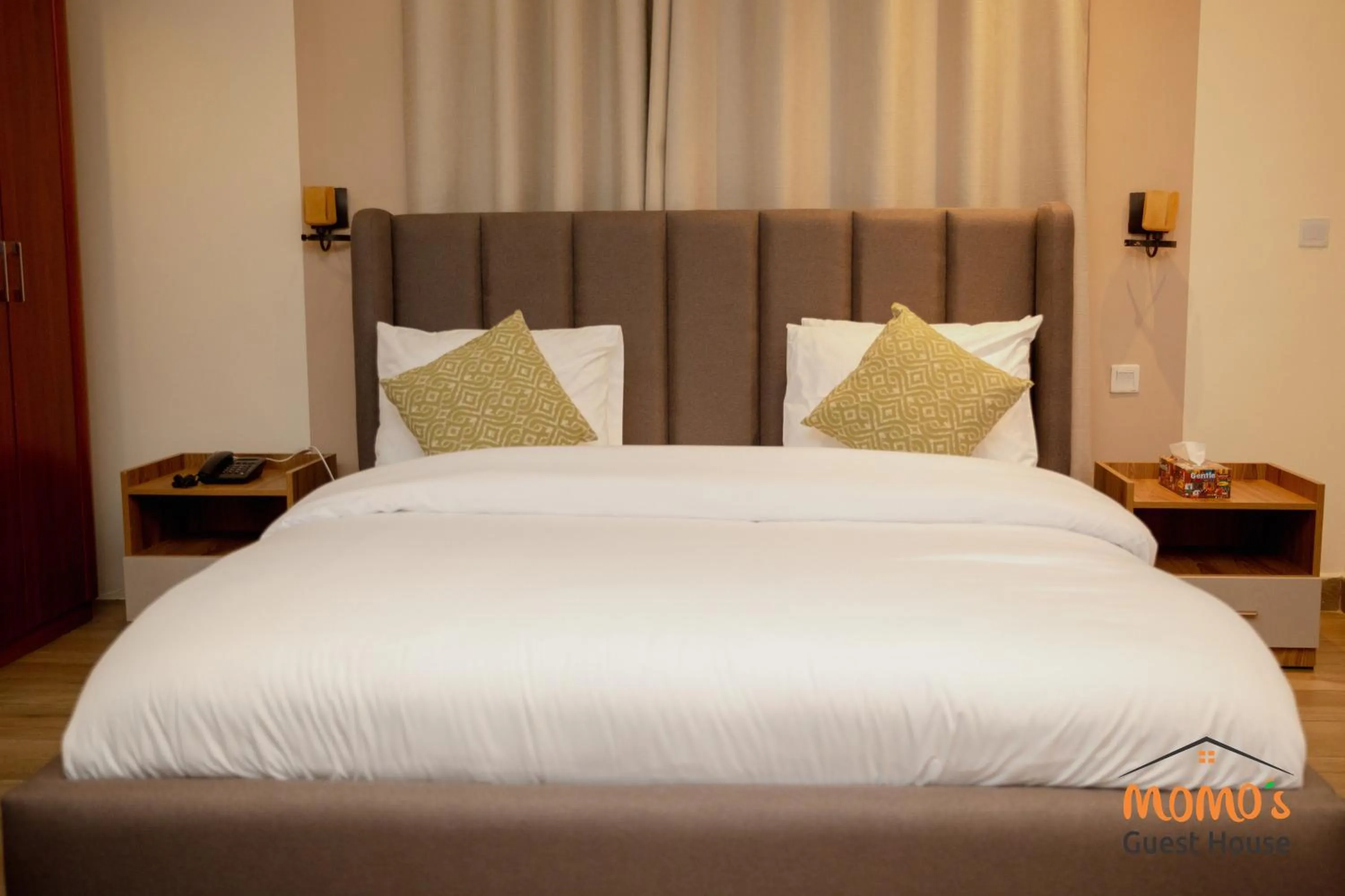 Bed in Momo's Hotel