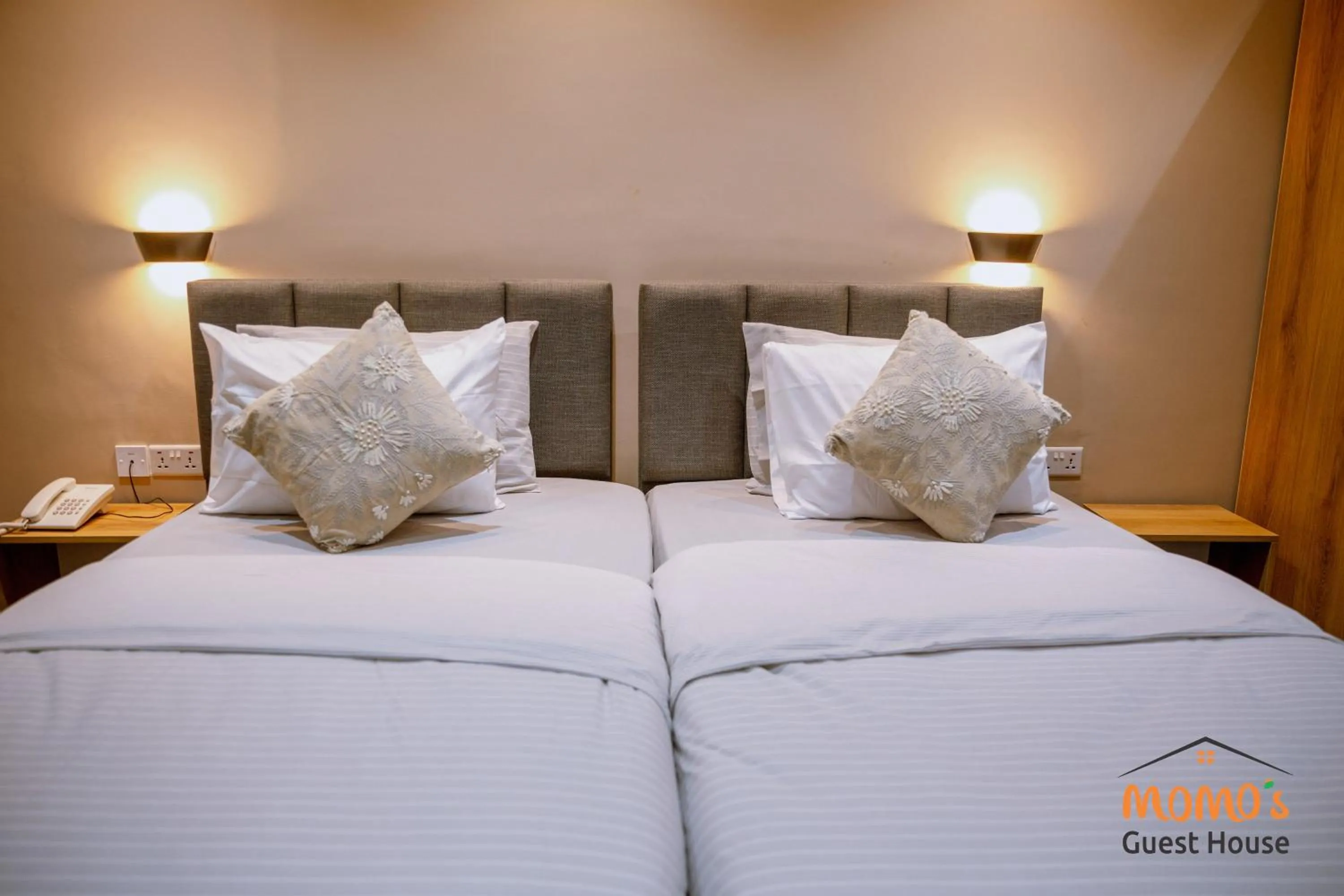 Bed in Momo's Hotel