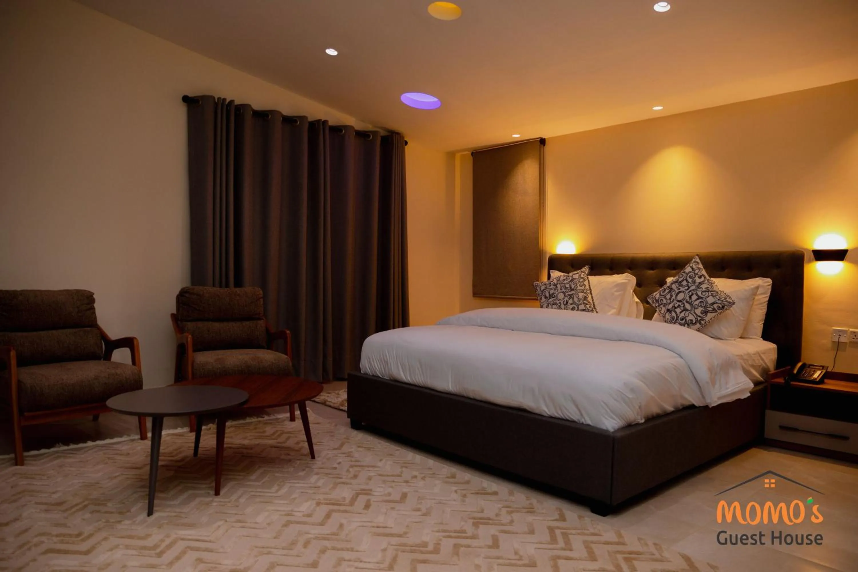Bed in Momo's Hotel