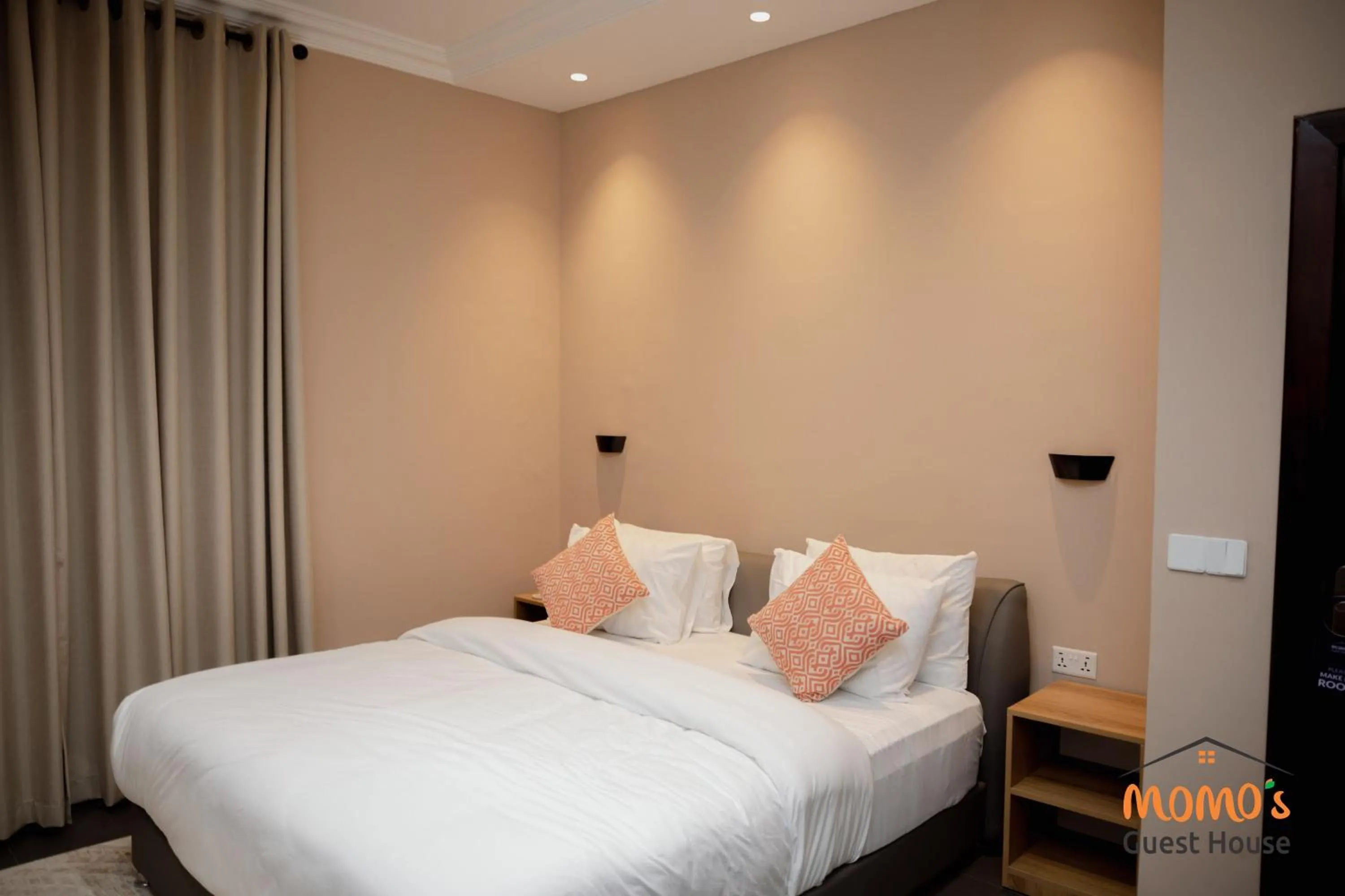 Bed in Momo's Hotel