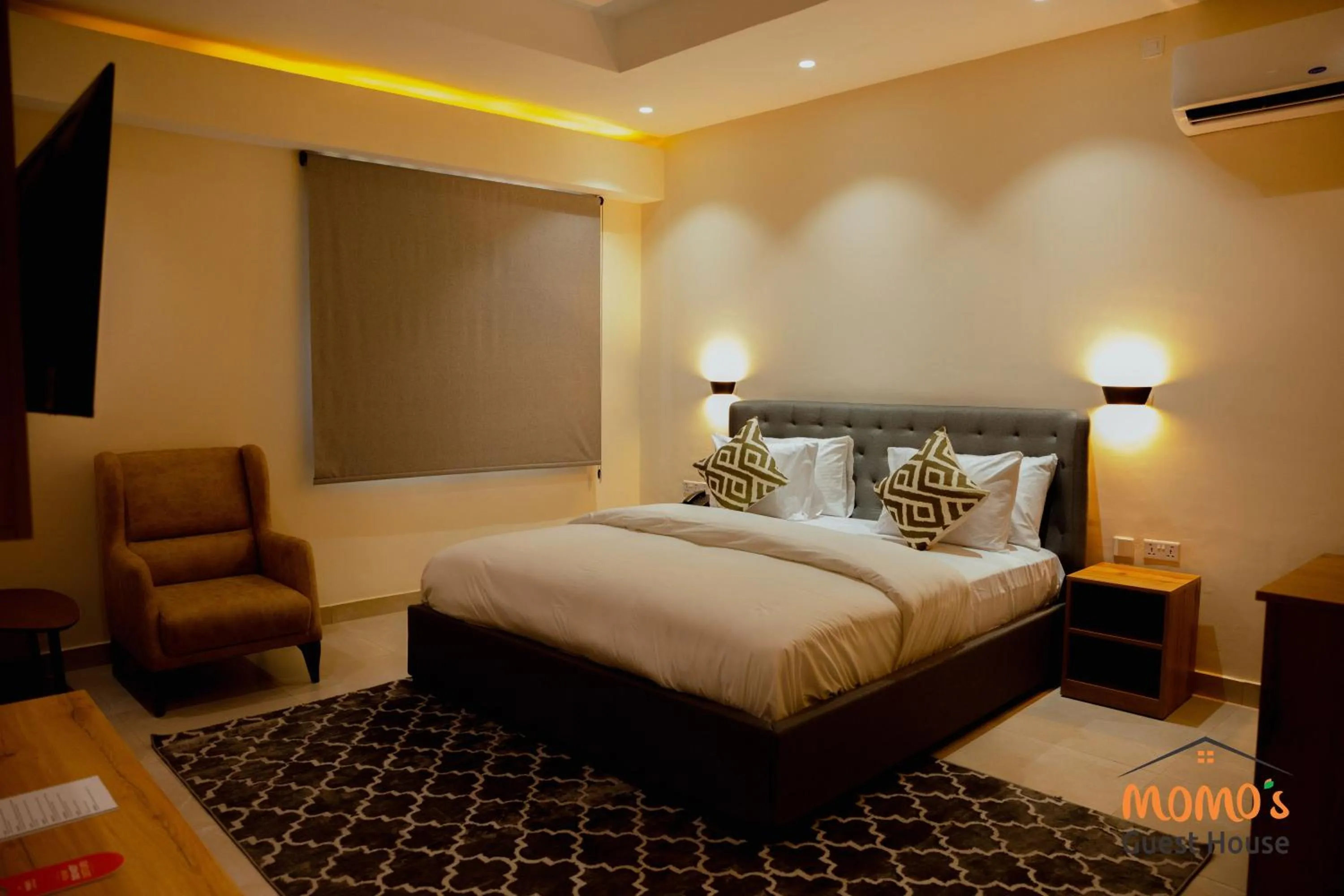 Bed in Momo's Hotel