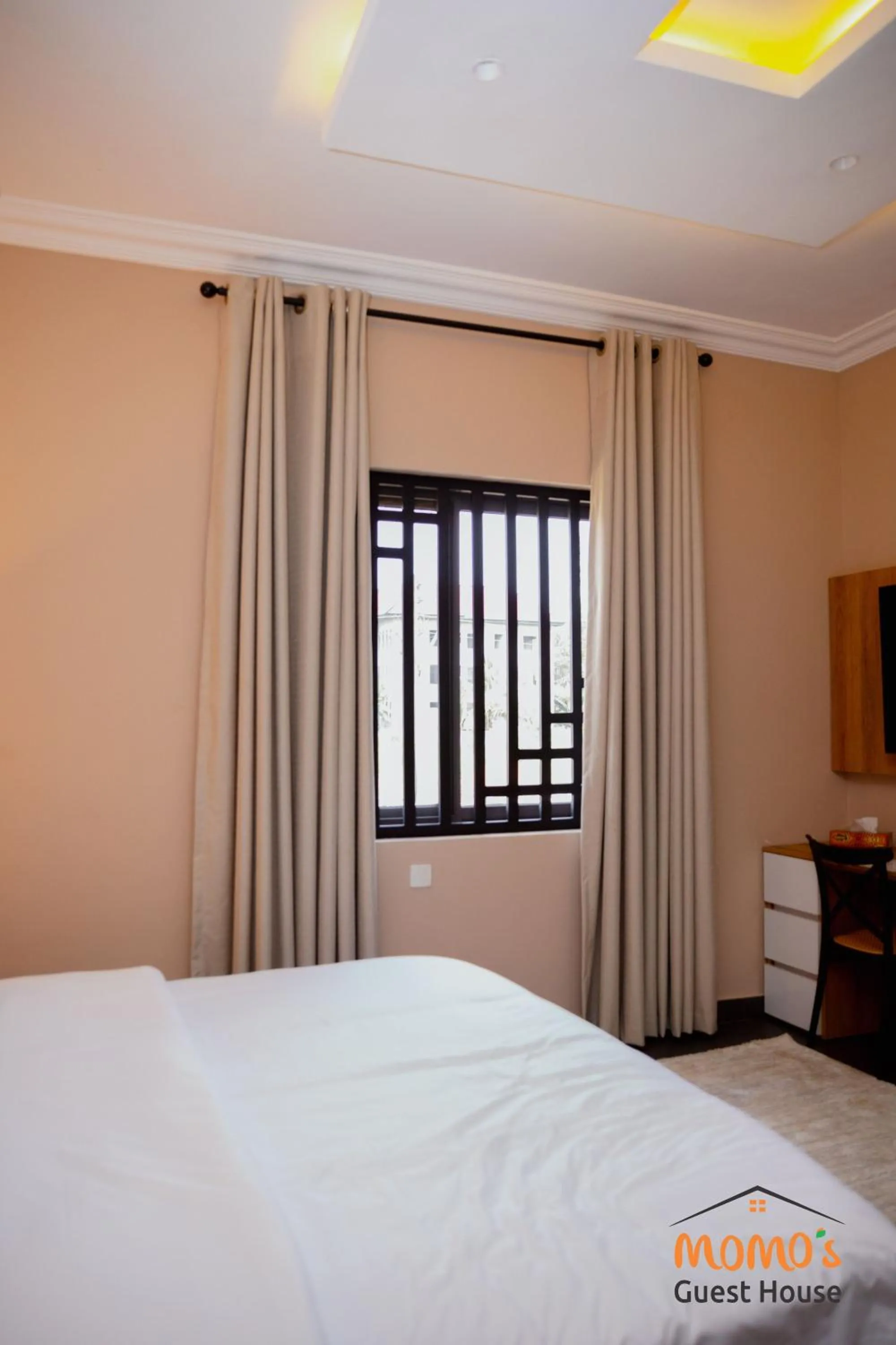 Bed in Momo's Hotel