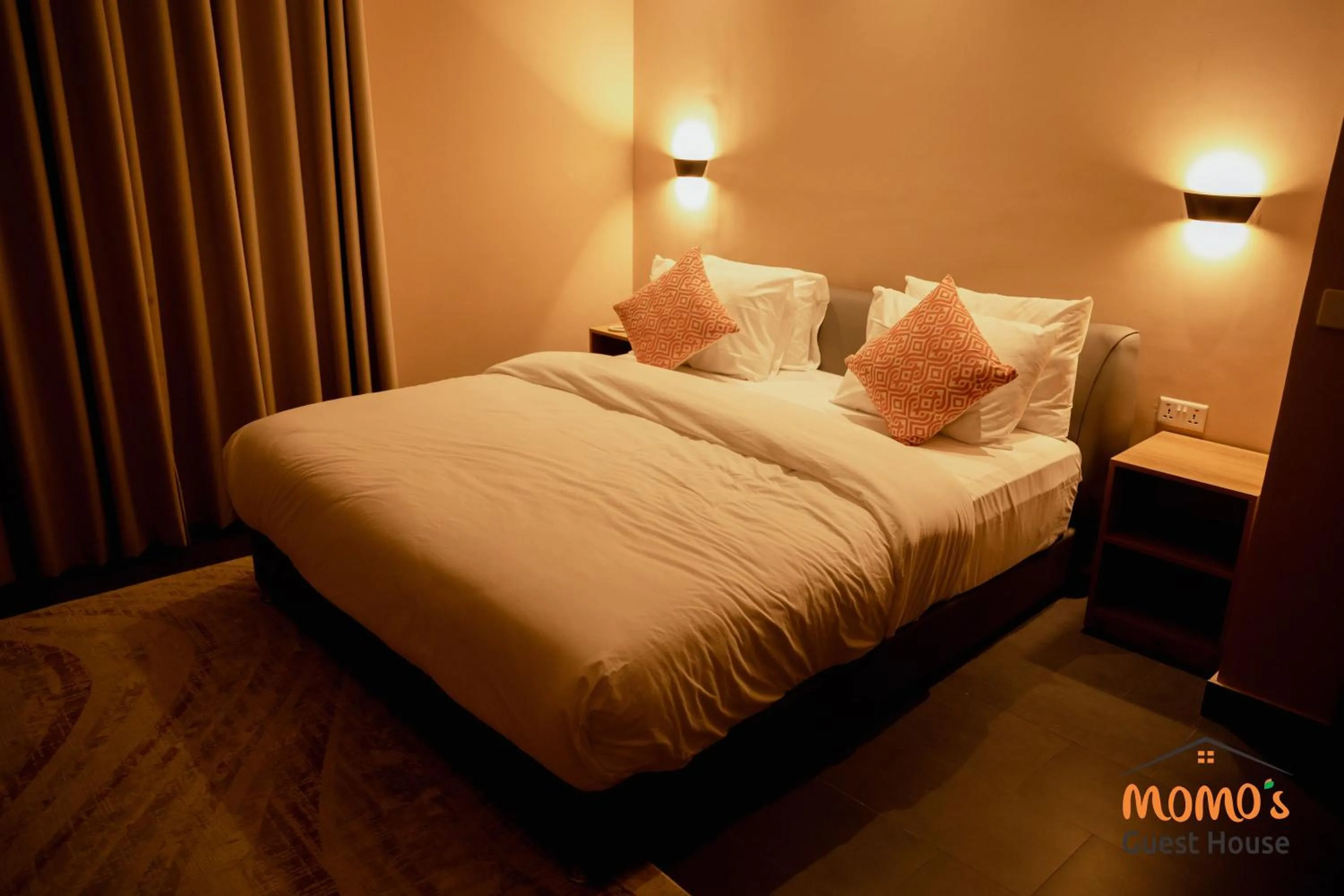 Bed in Momo's Hotel
