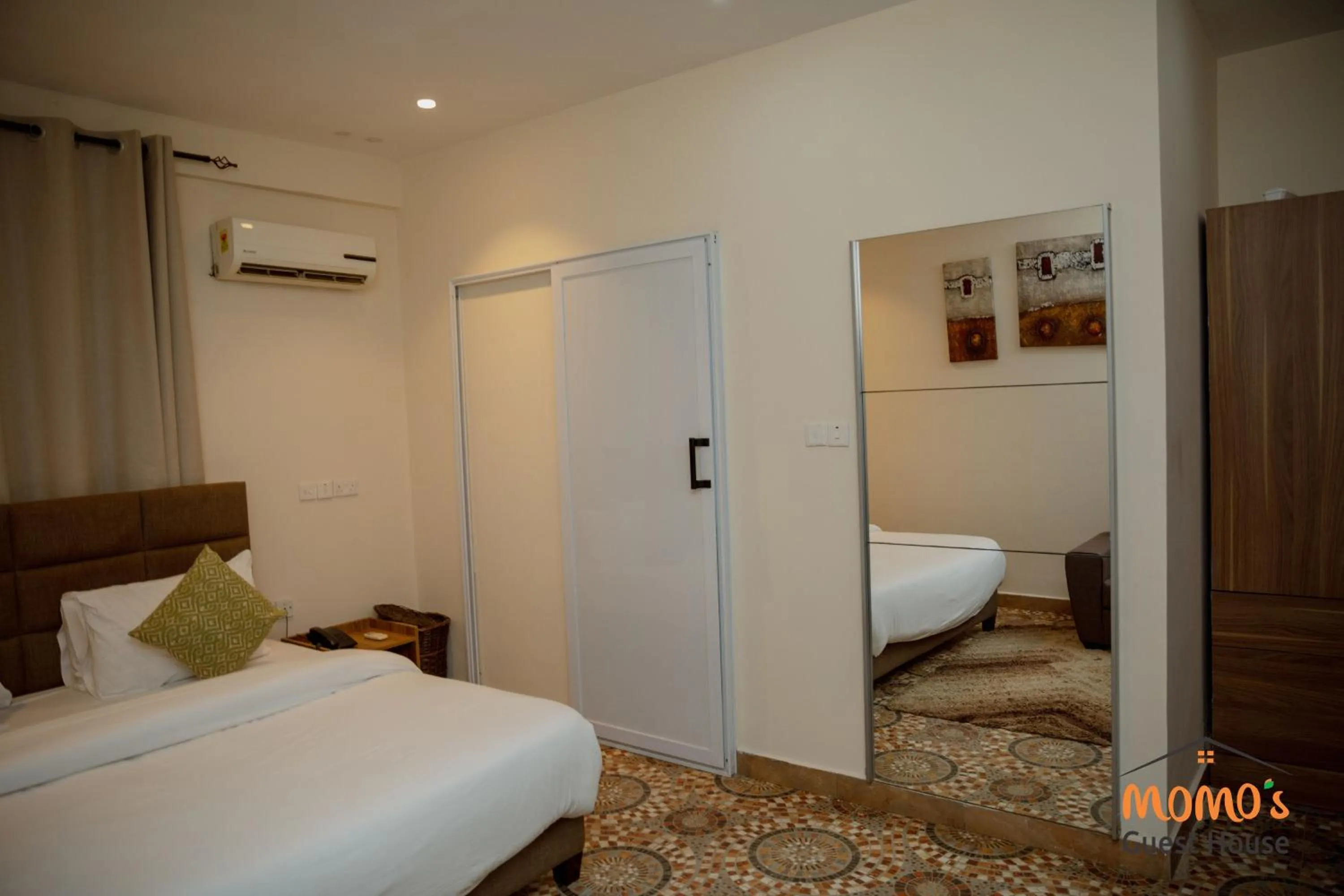 Bed in Momo's Hotel
