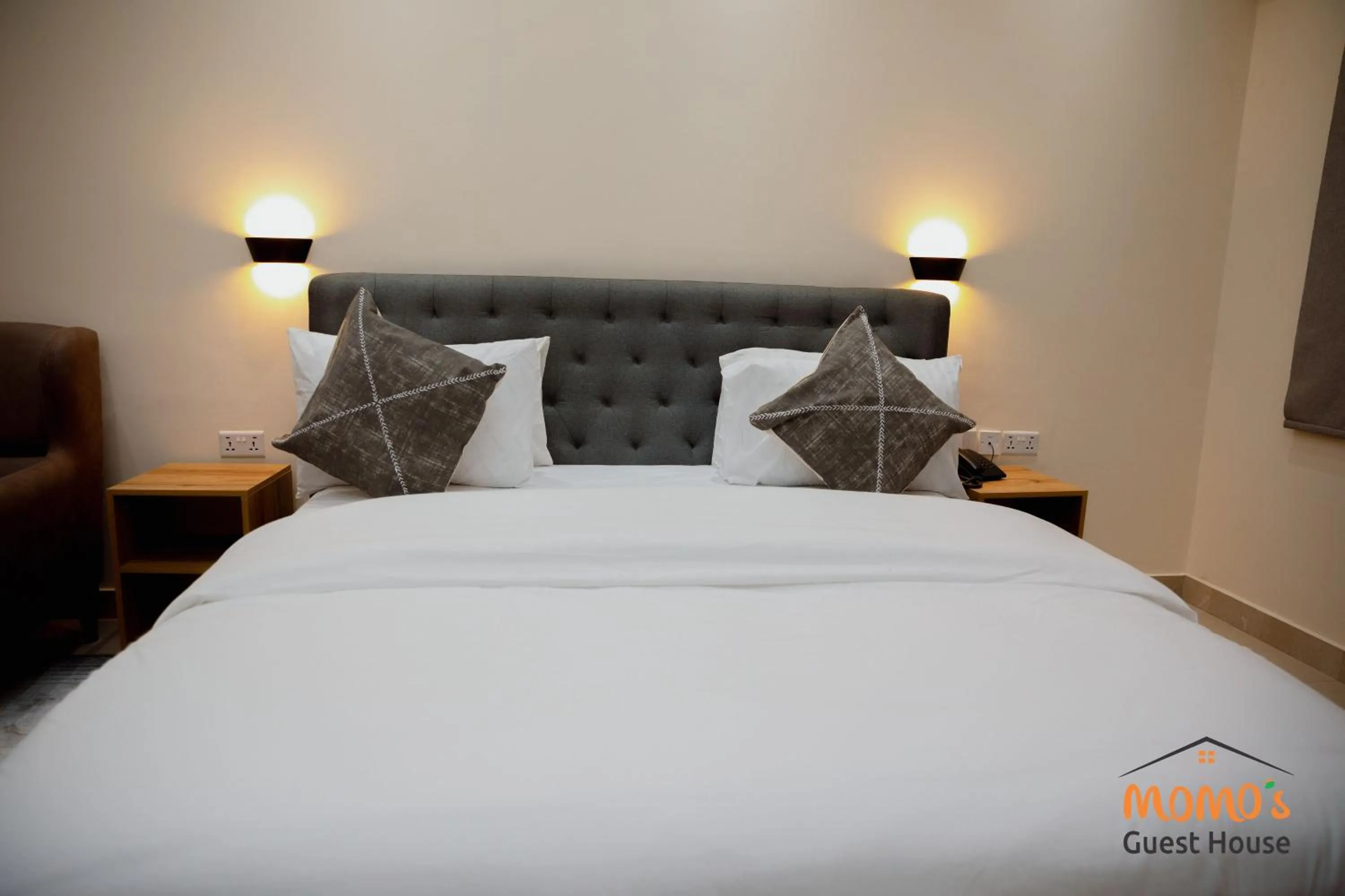 Bed in Momo's Hotel