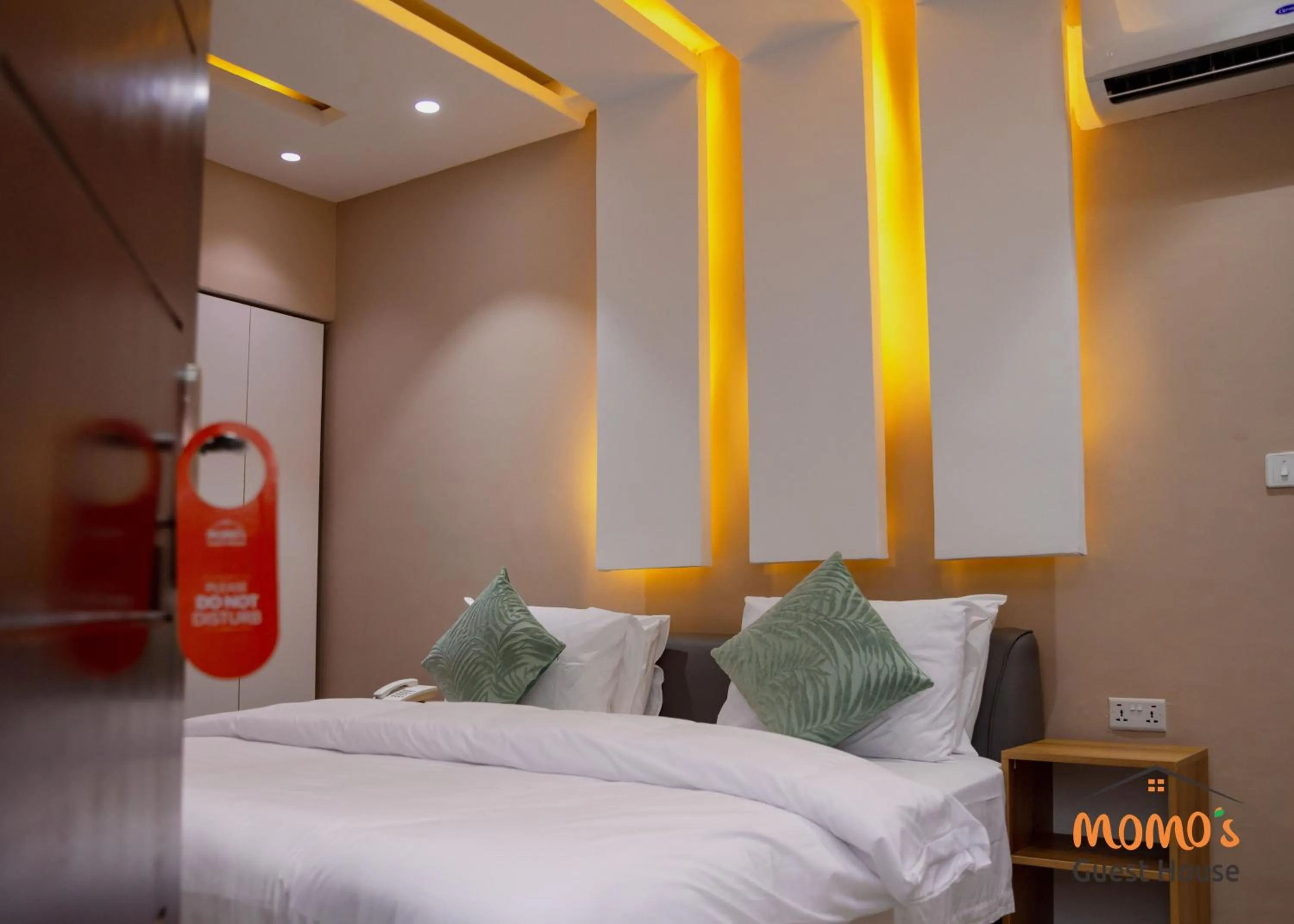 Bed in Momo's Hotel
