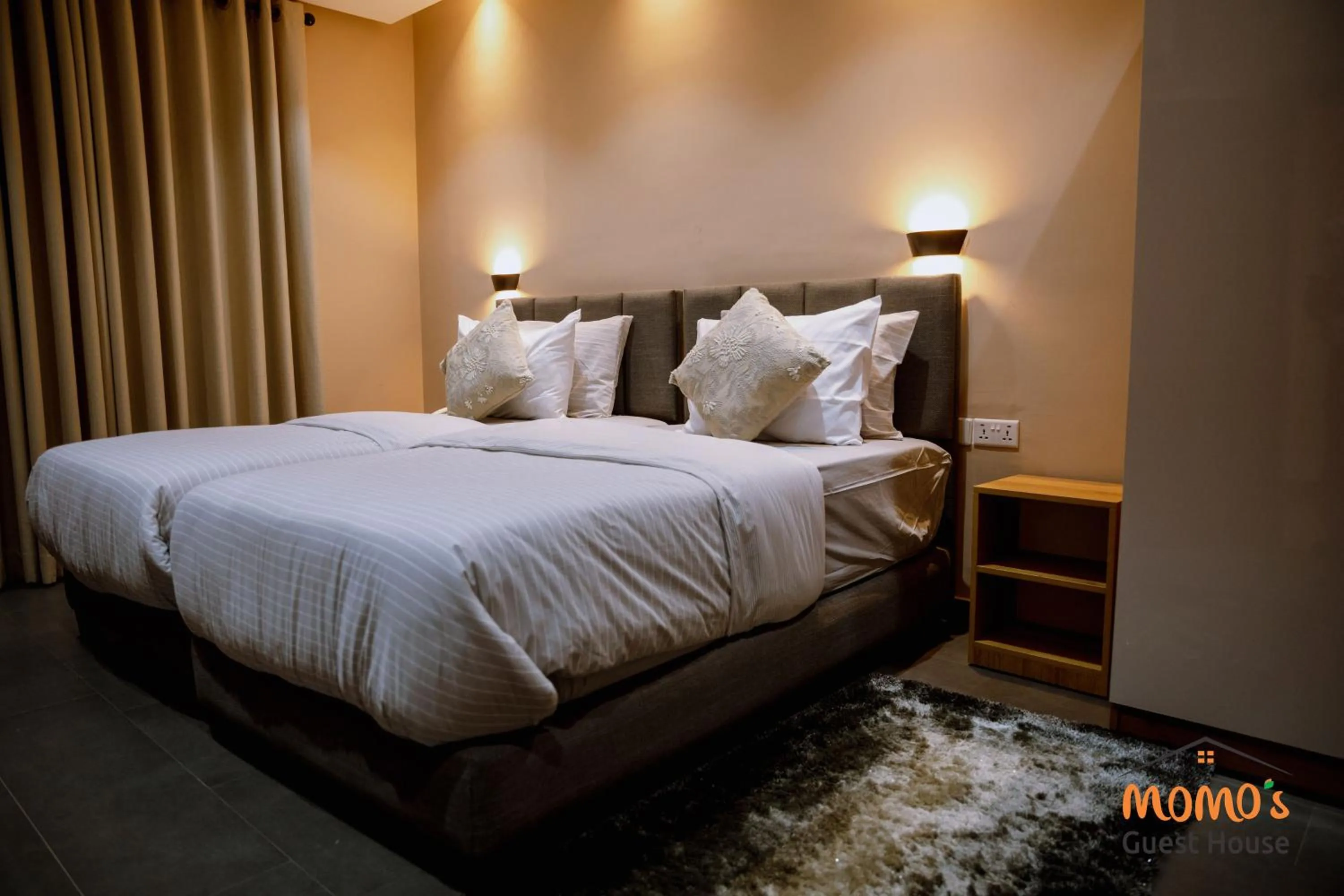 Bed in Momo's Hotel