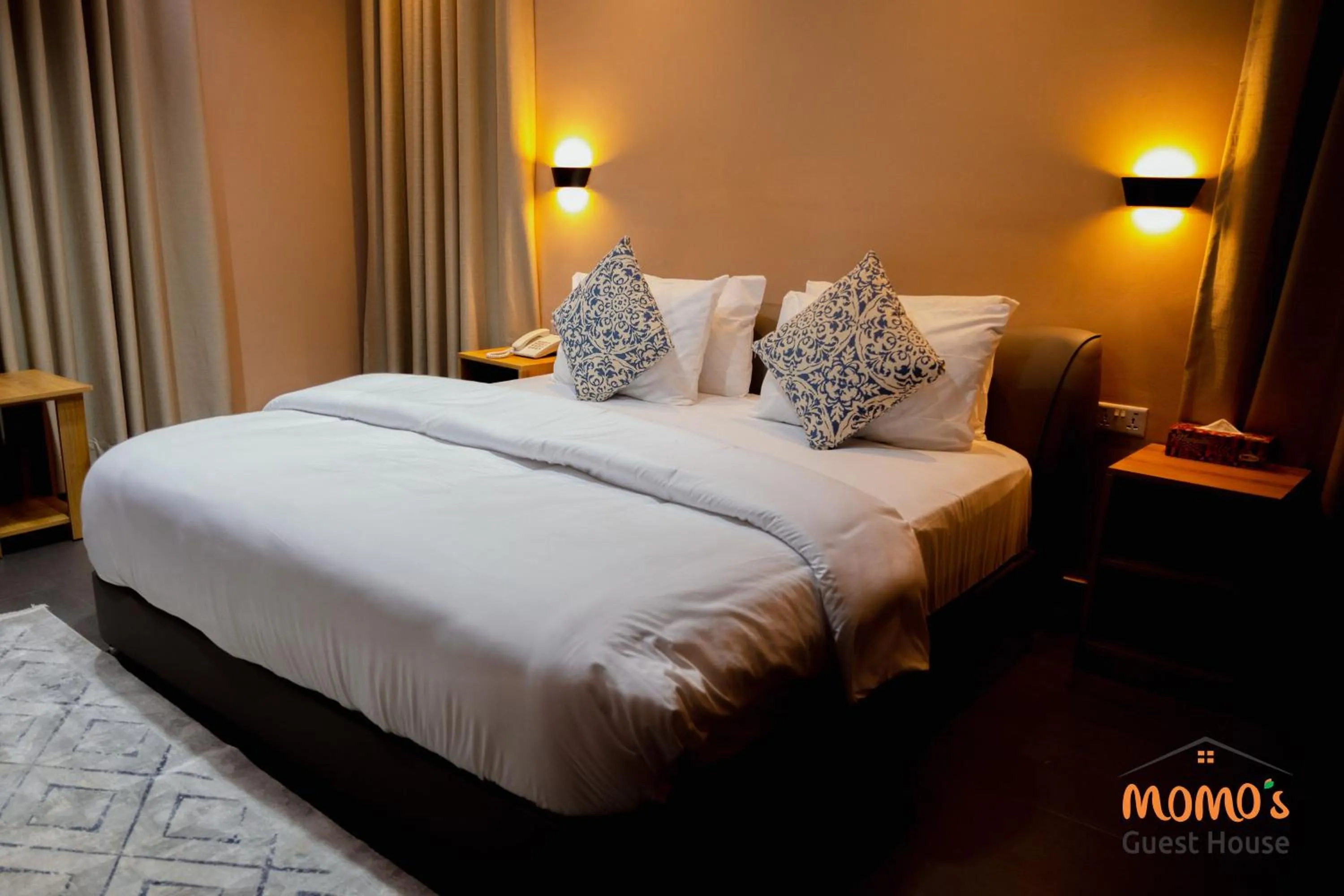 Bed in Momo's Hotel