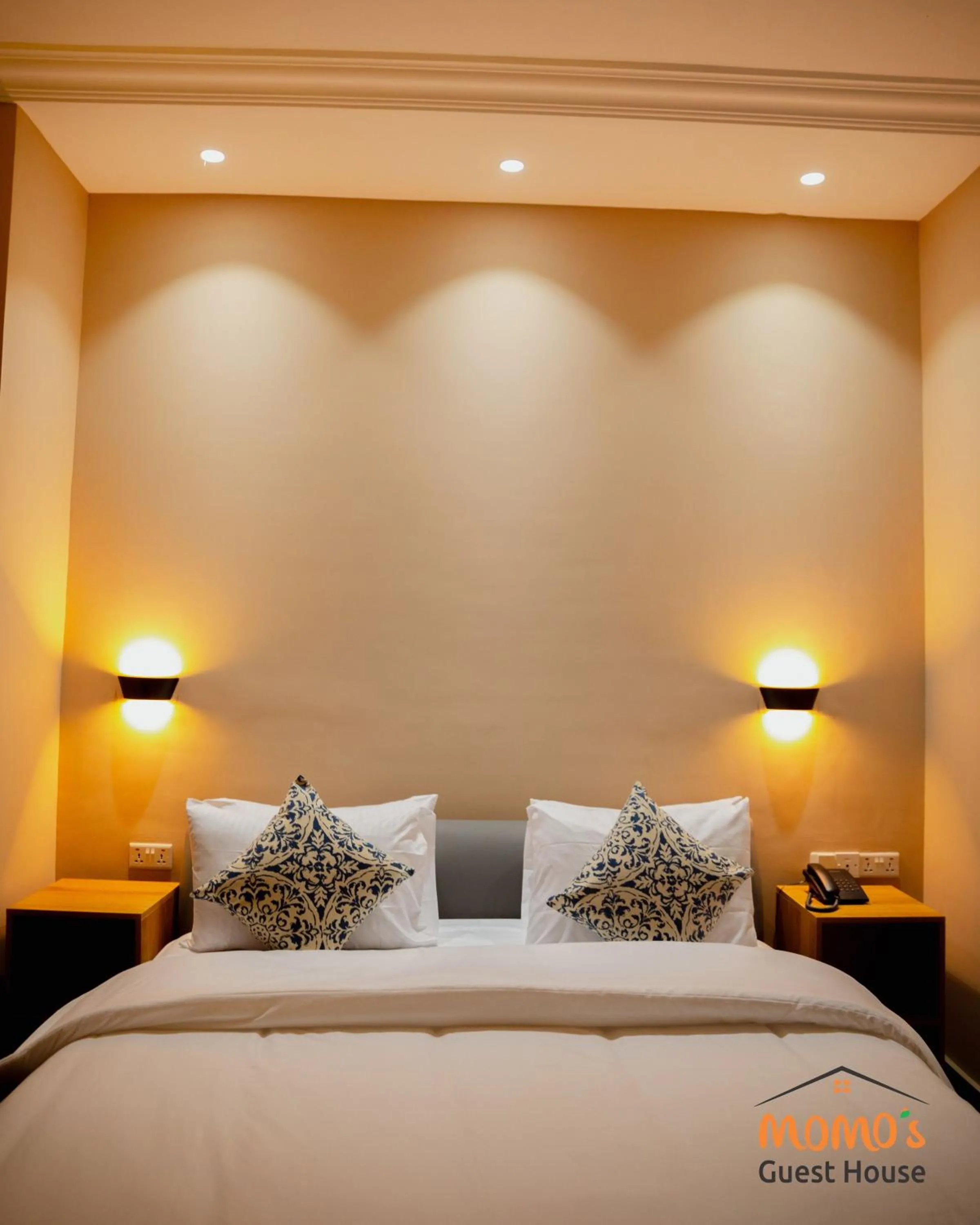 Bed in Momo's Hotel