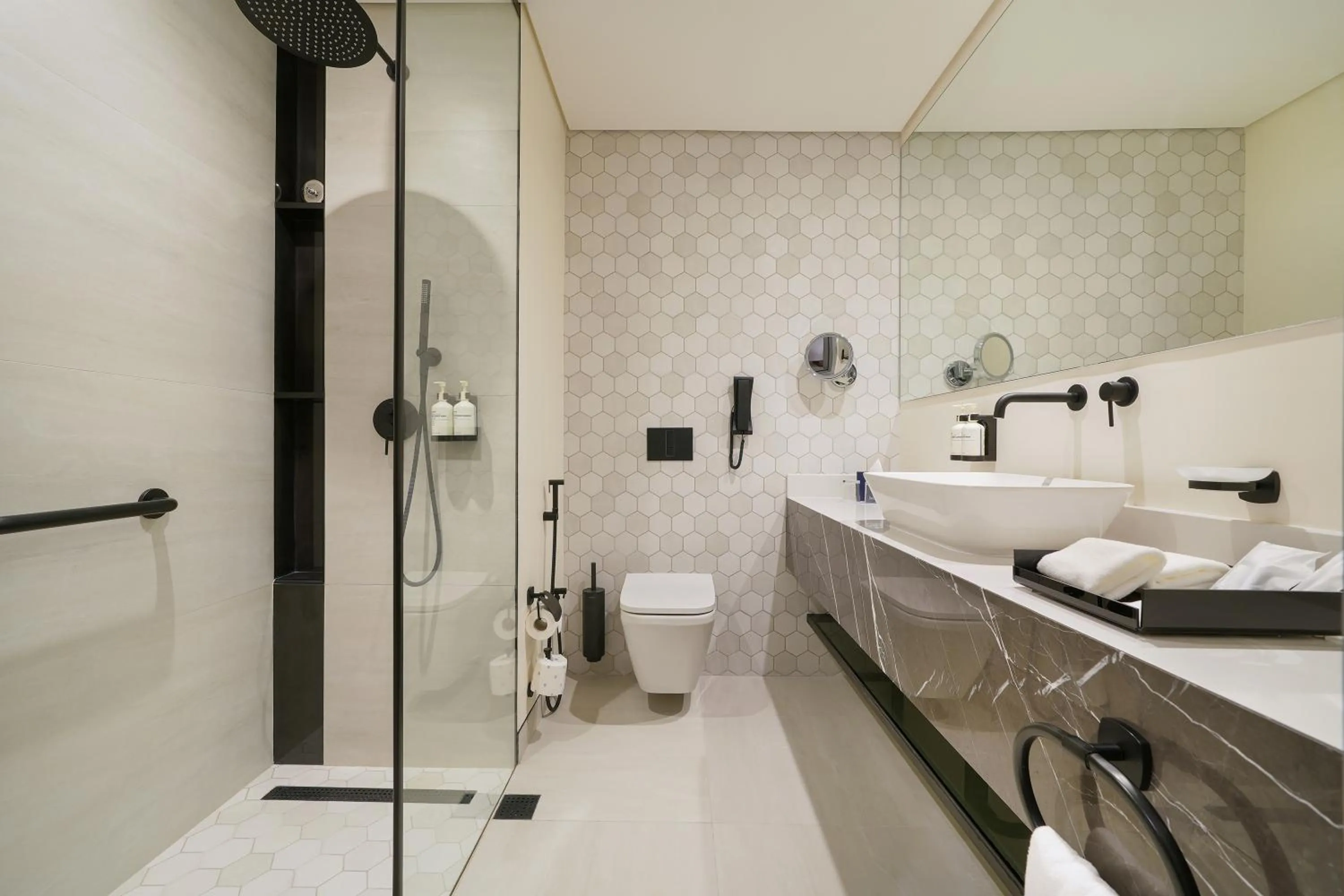 Shower in Nova M Hotel Olaya Riyadh edge By Rotana