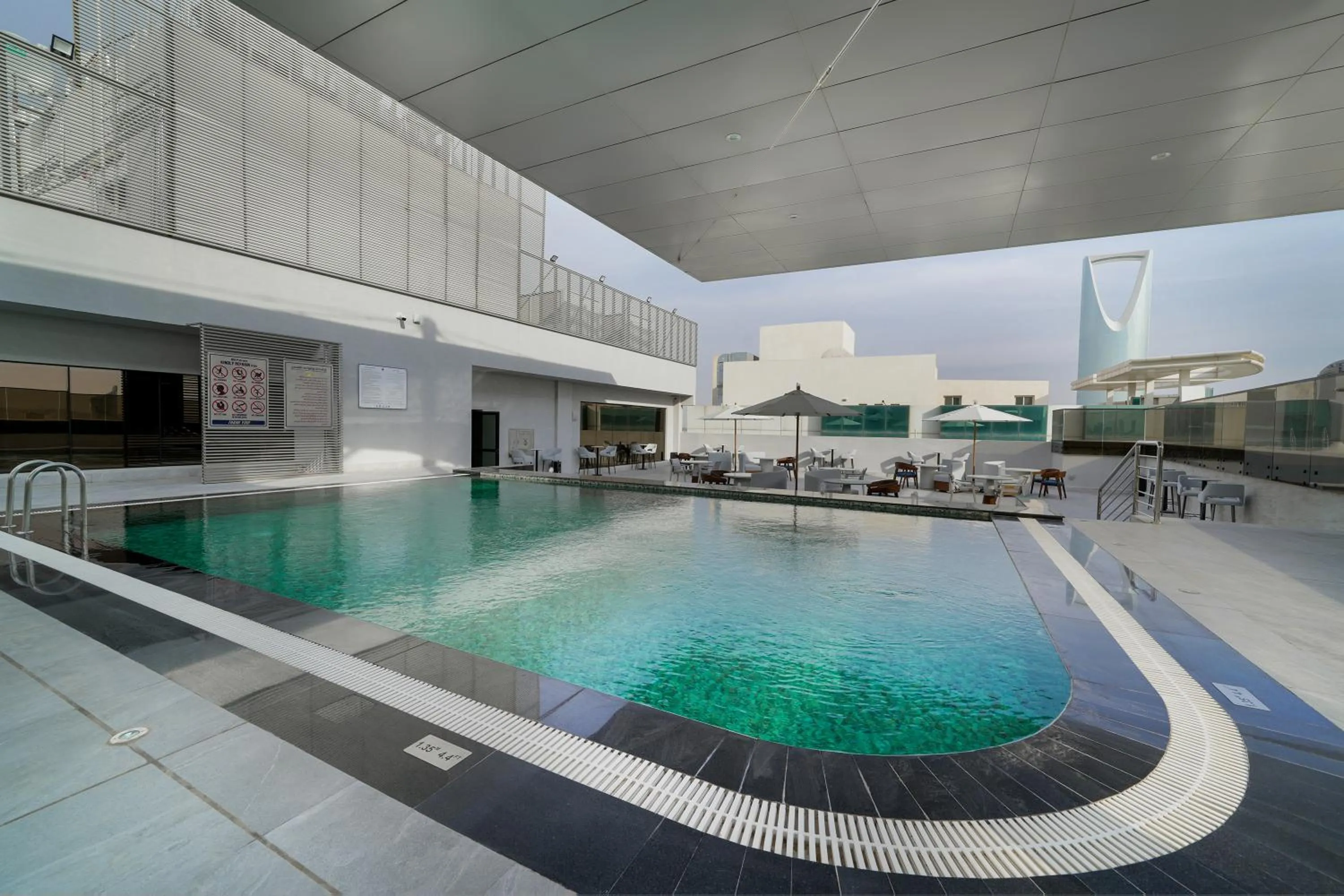 Swimming pool in Nova M Hotel Olaya Riyadh edge By Rotana