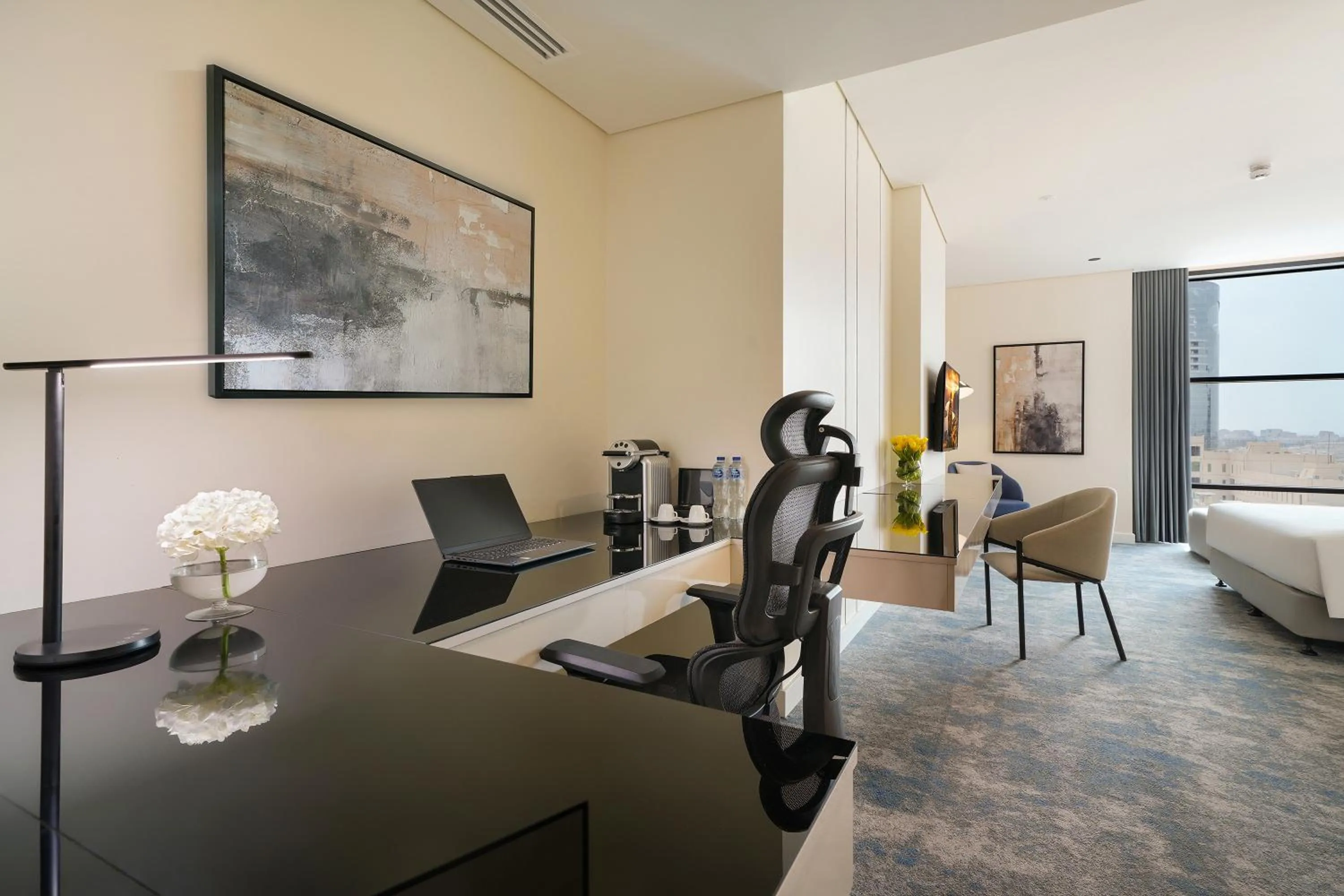 Seating area, Bed in Nova M Hotel Olaya Riyadh edge By Rotana