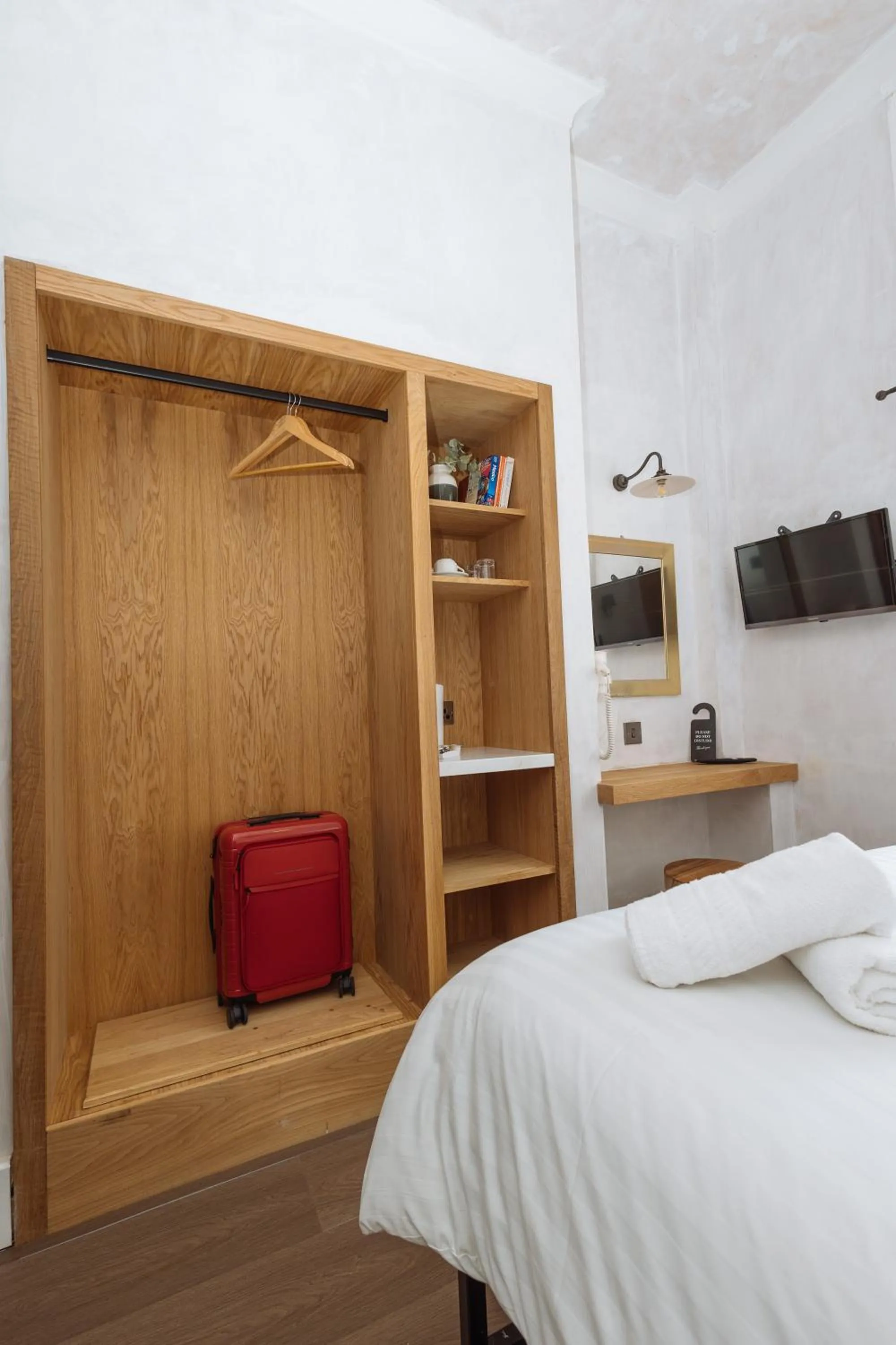 wardrobe, Bed in Central Hotel