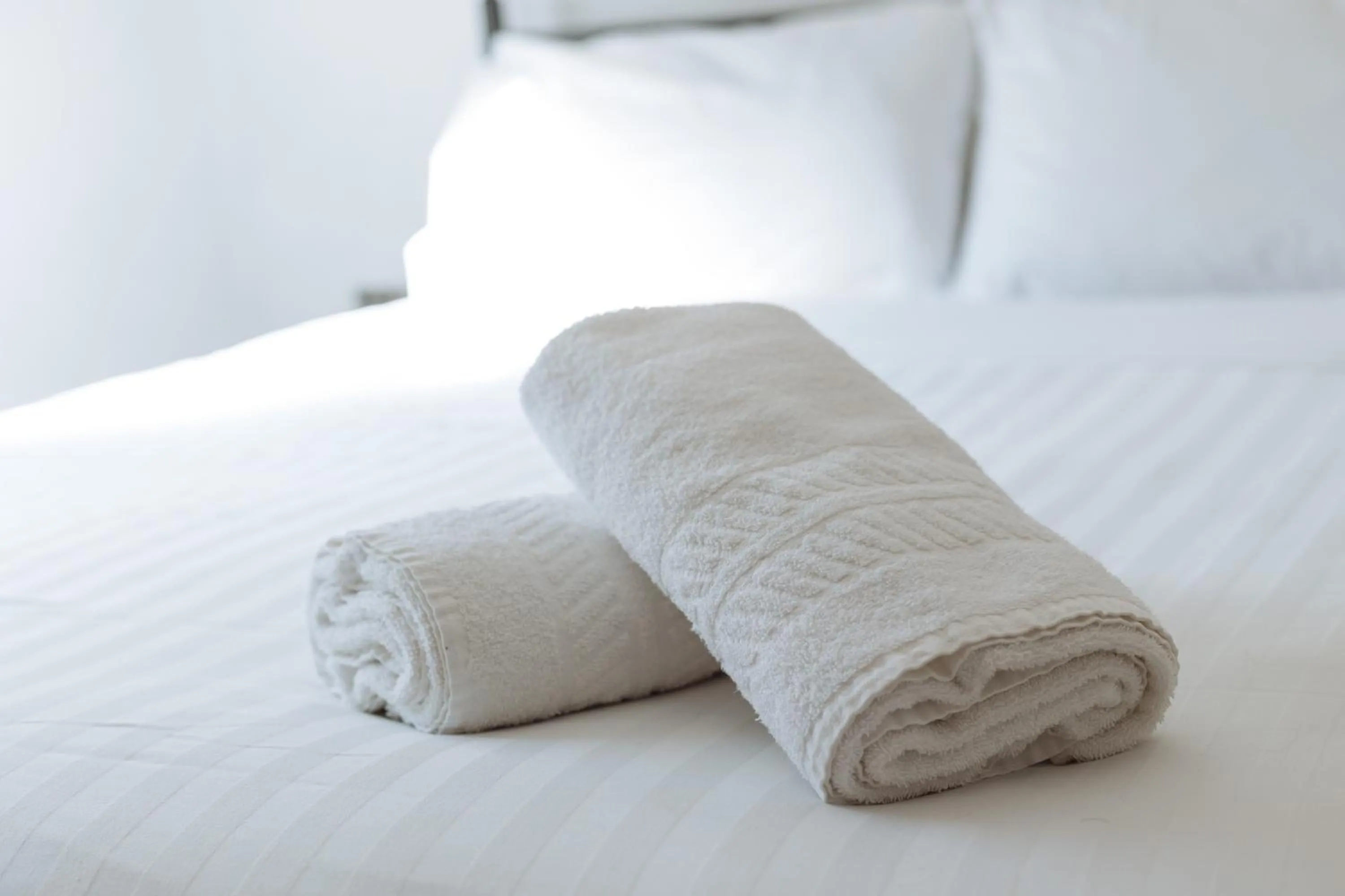 towels, Bed in Central Hotel