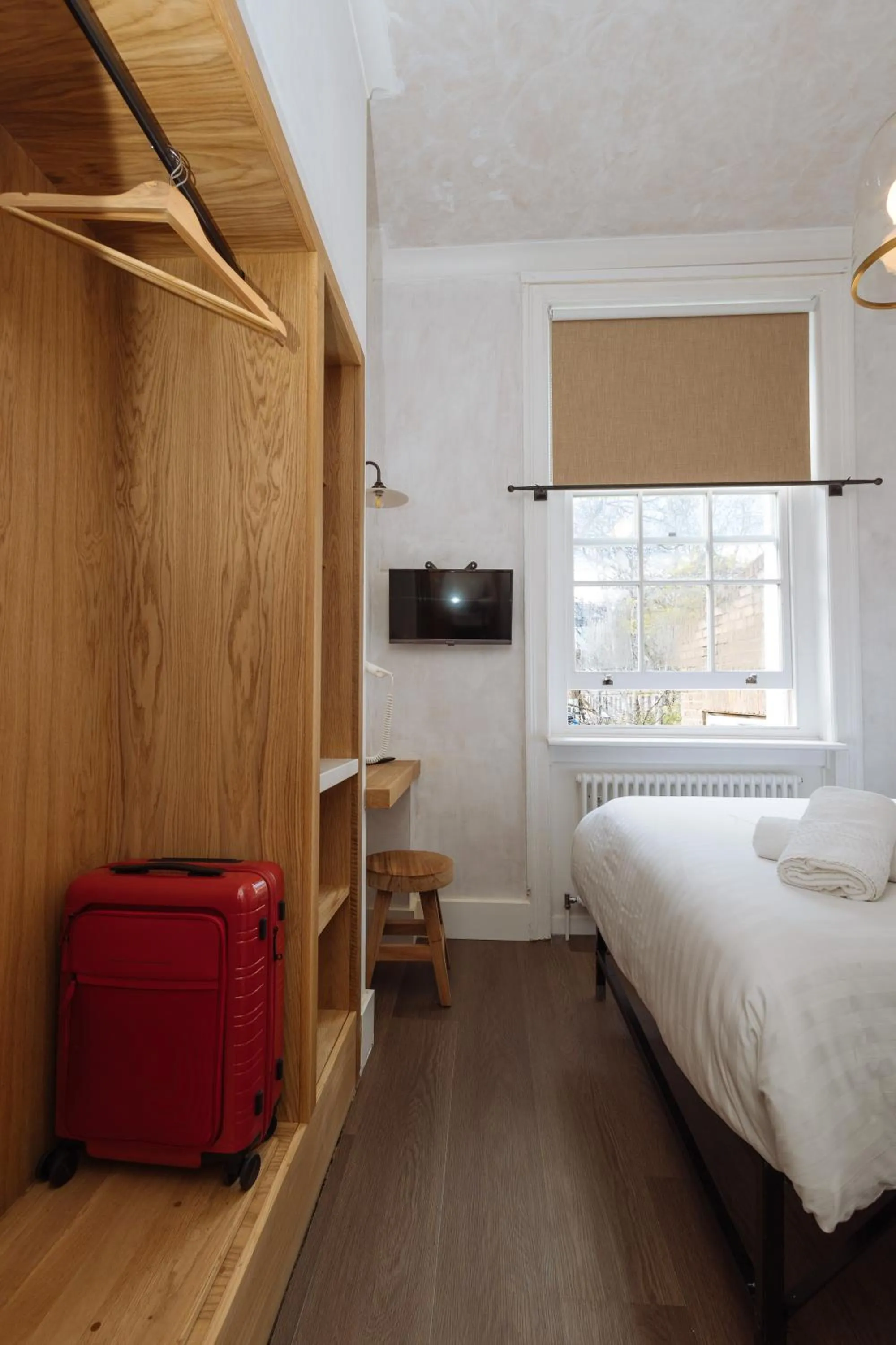 wardrobe, Bed in Central Hotel