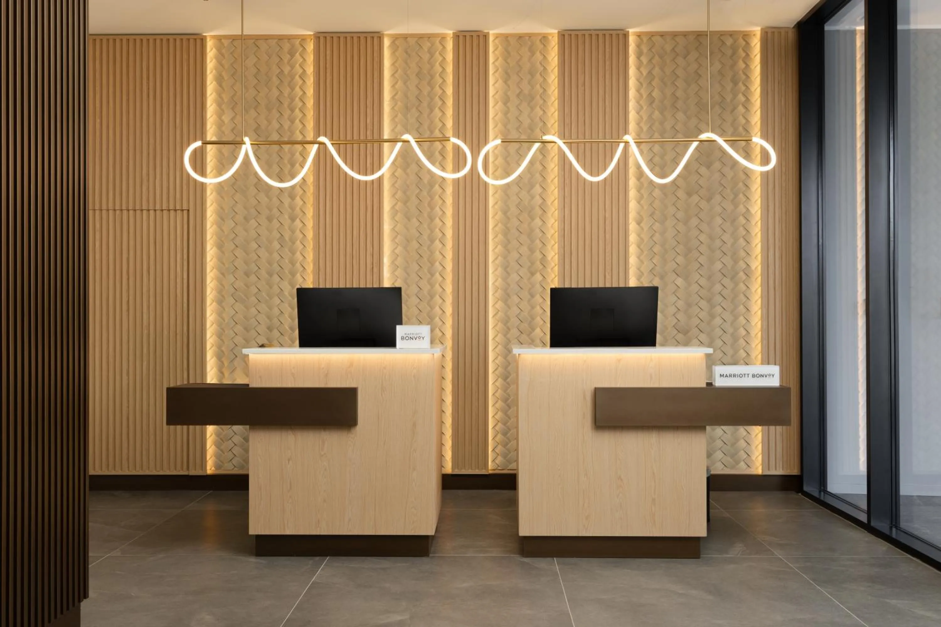 Lobby or reception in Courtyard by Marriott Milano Linate