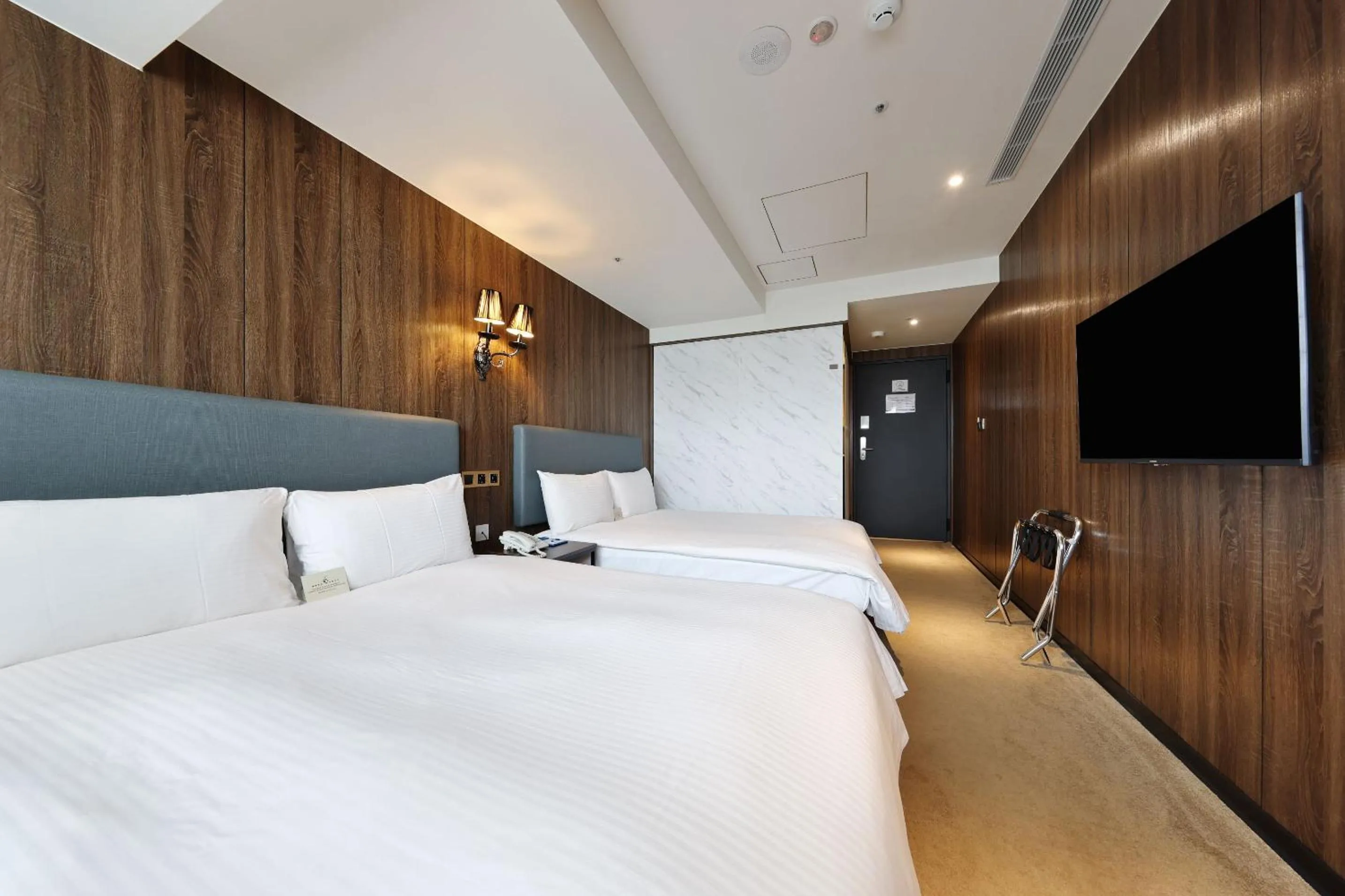 Bed in Airline Inn Ximen