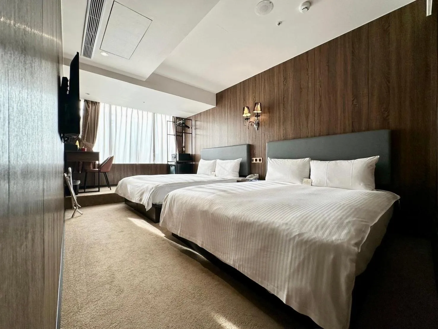 Bed in Airline Inn Ximen