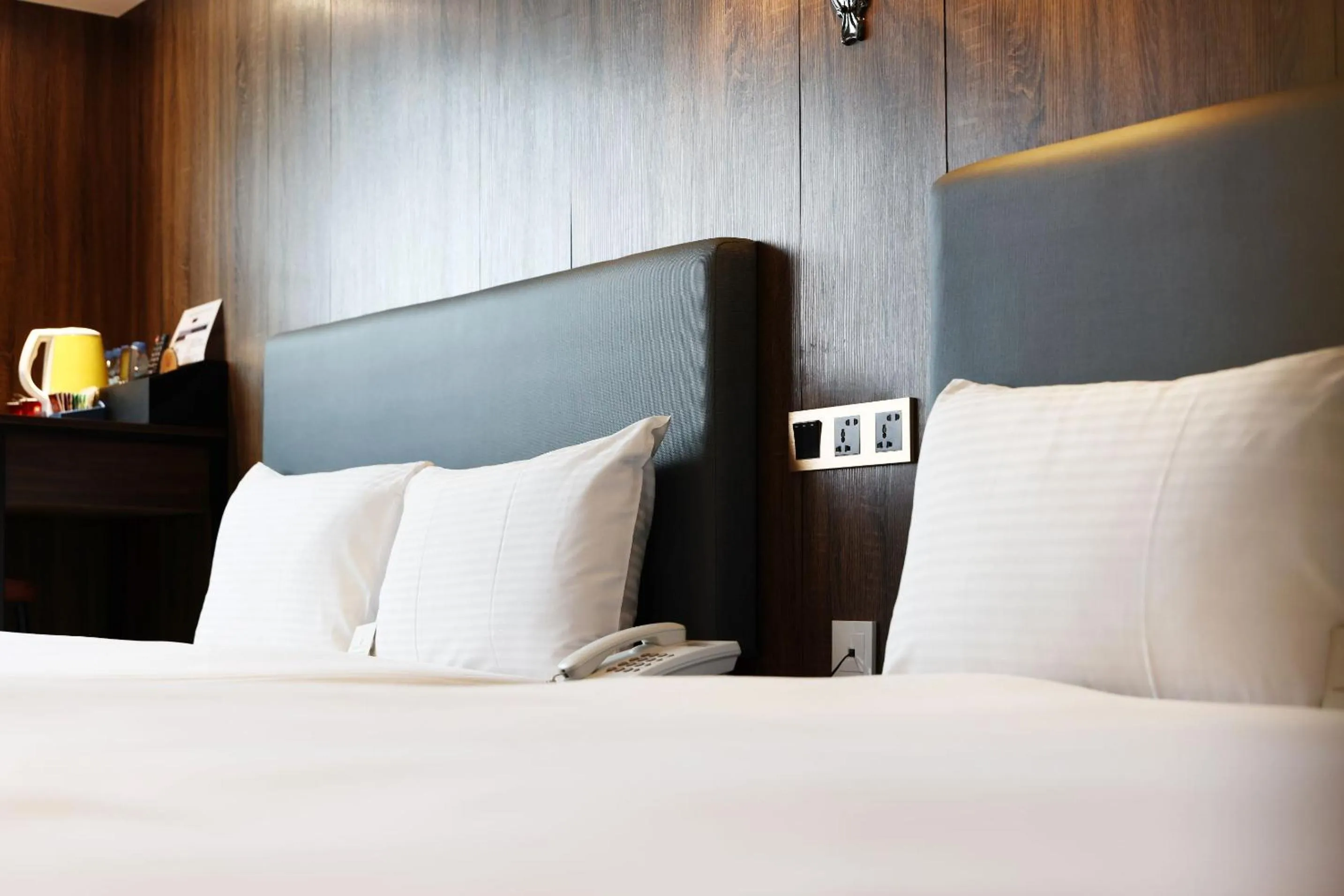 Bed in Airline Inn Ximen