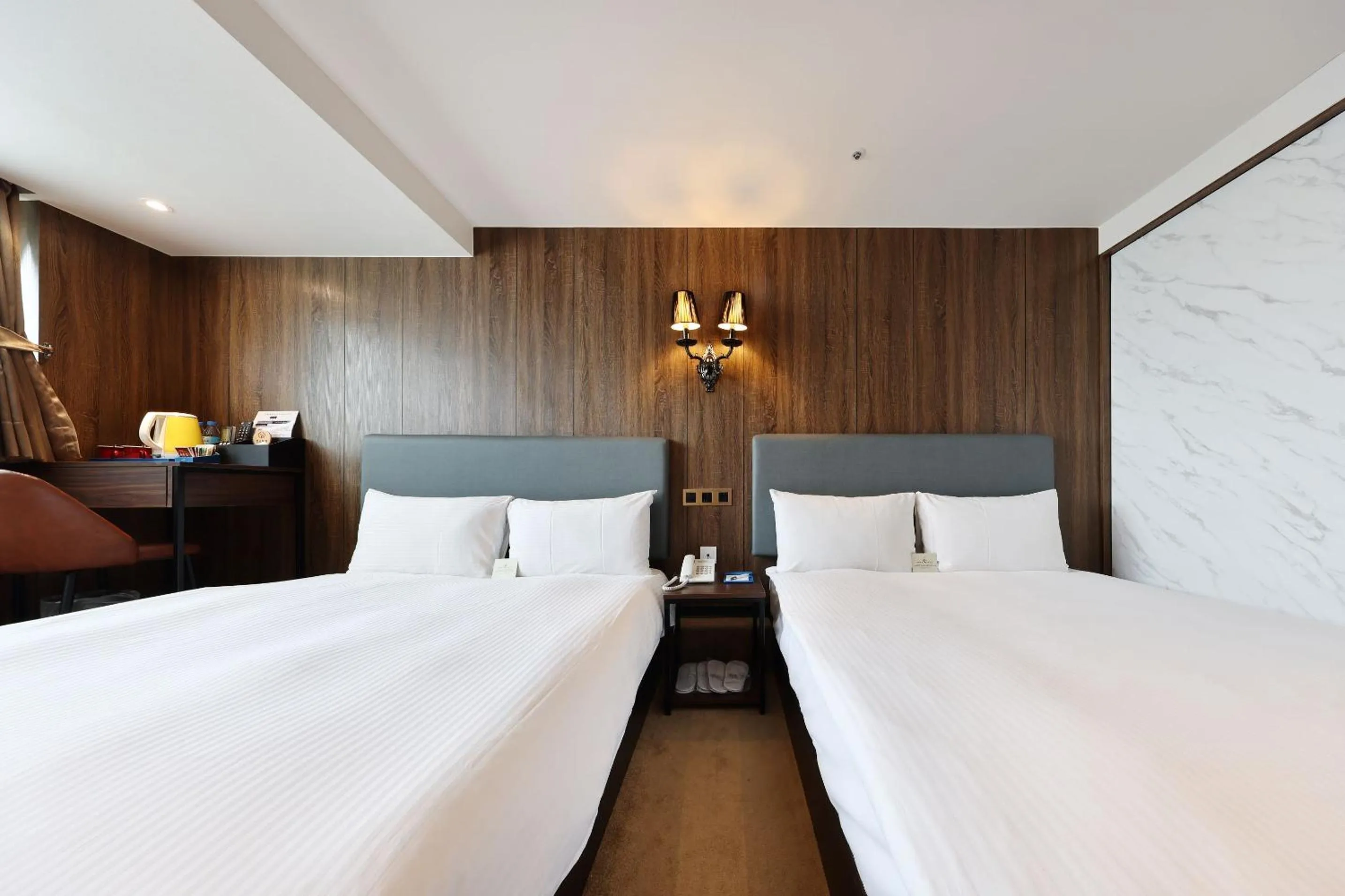 Bed in Airline Inn Ximen