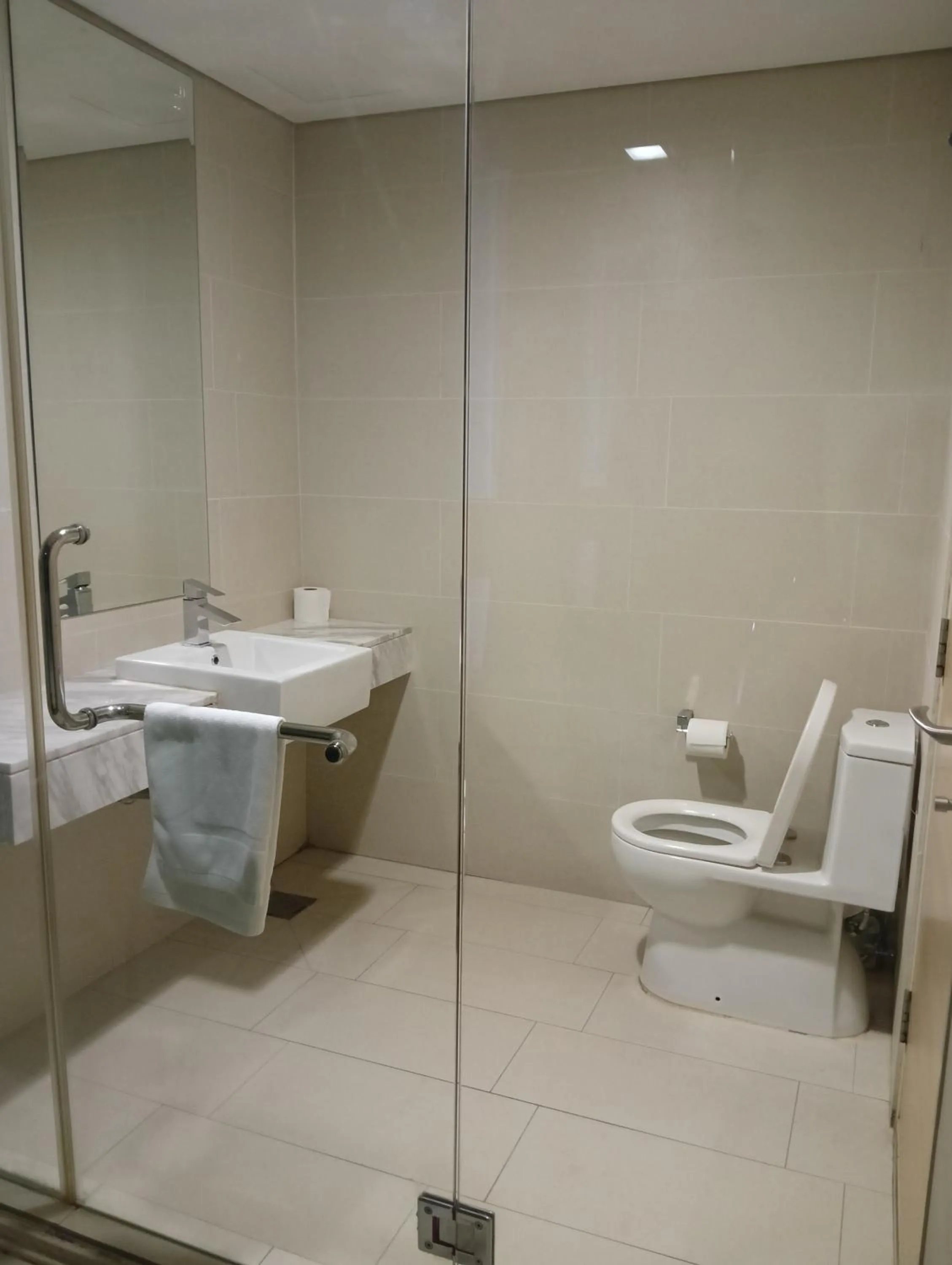 Toilet in The Straits Suites by Ciconia