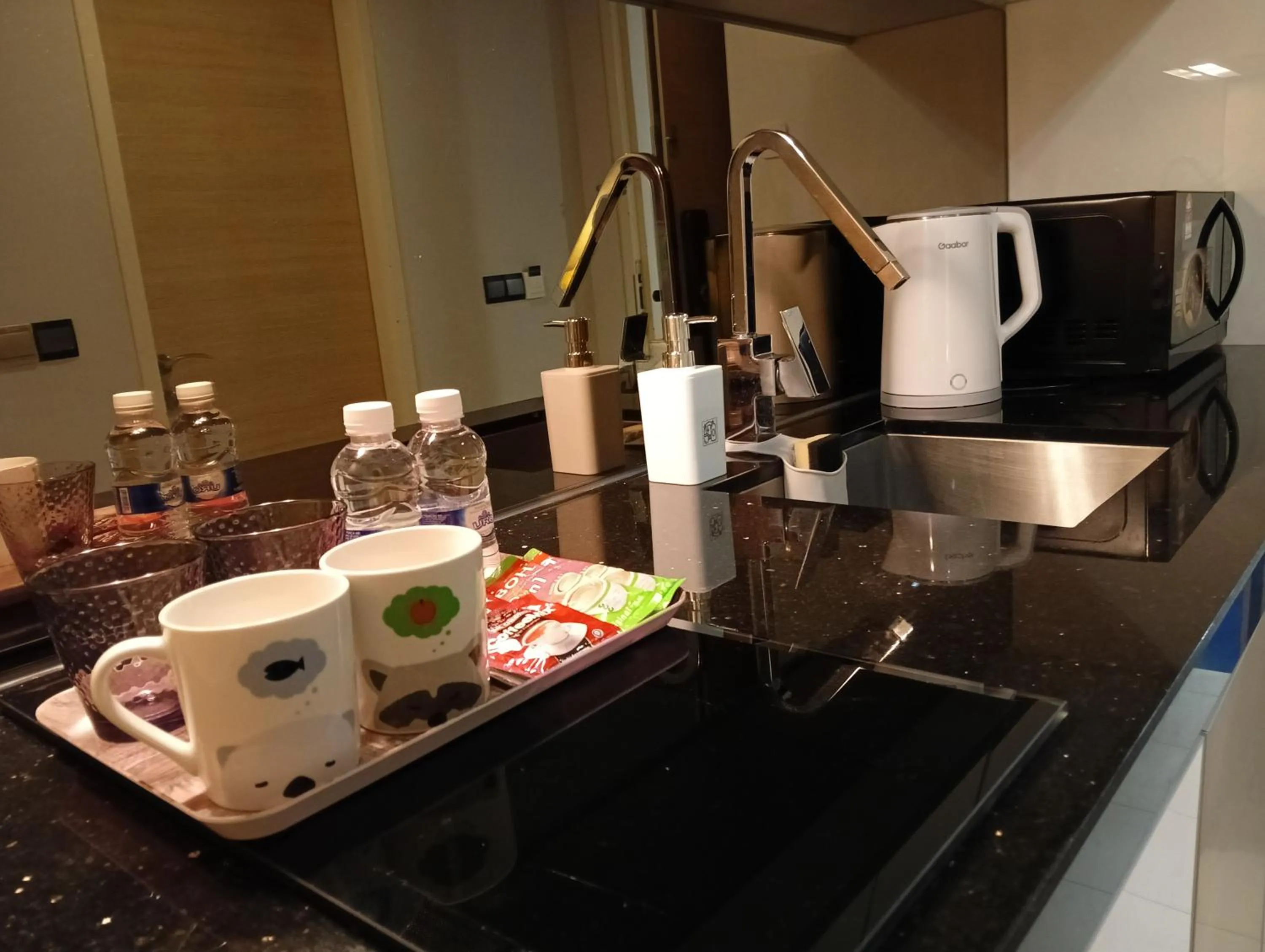 Kitchen or kitchenette in The Straits Suites by Ciconia