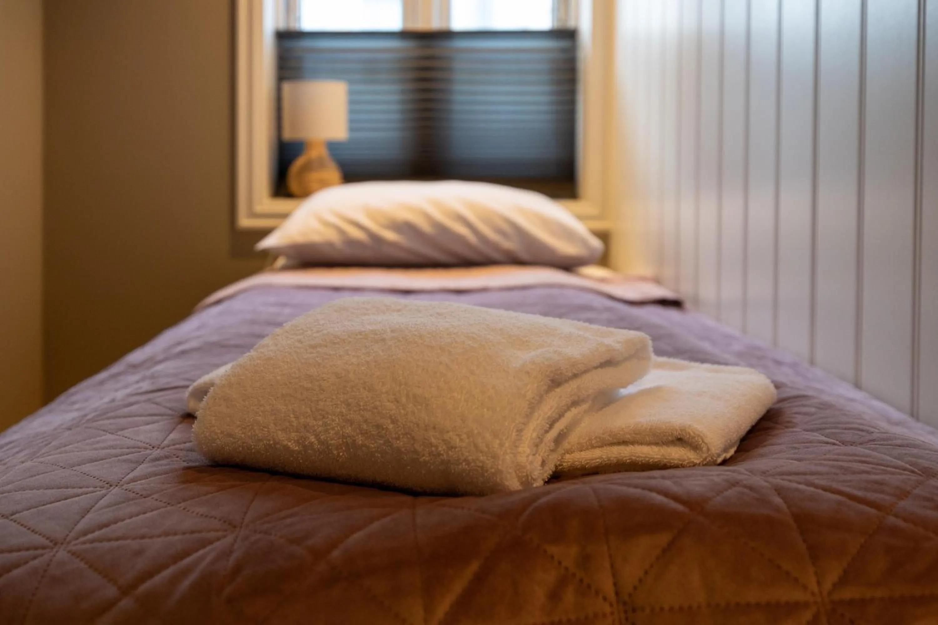 Bed in Florø Apartments Hotell