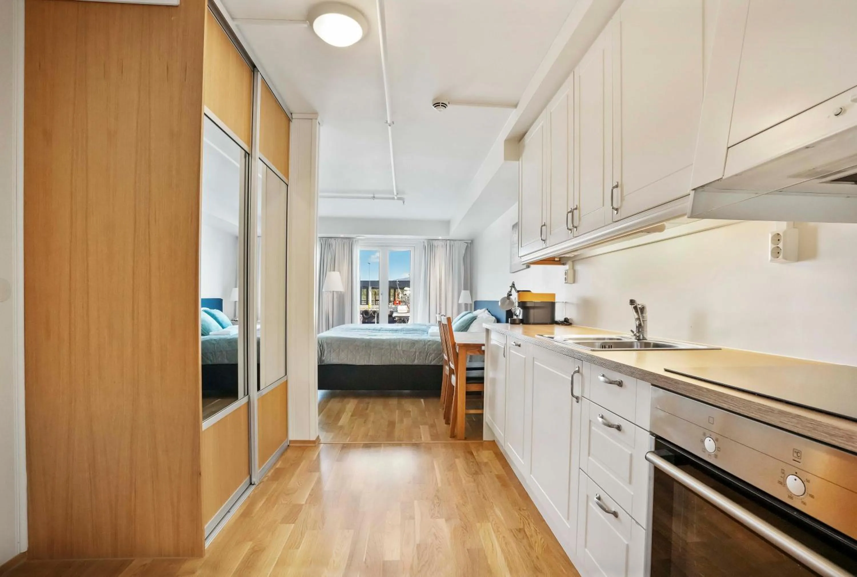 Bed in Florø Apartments Hotell